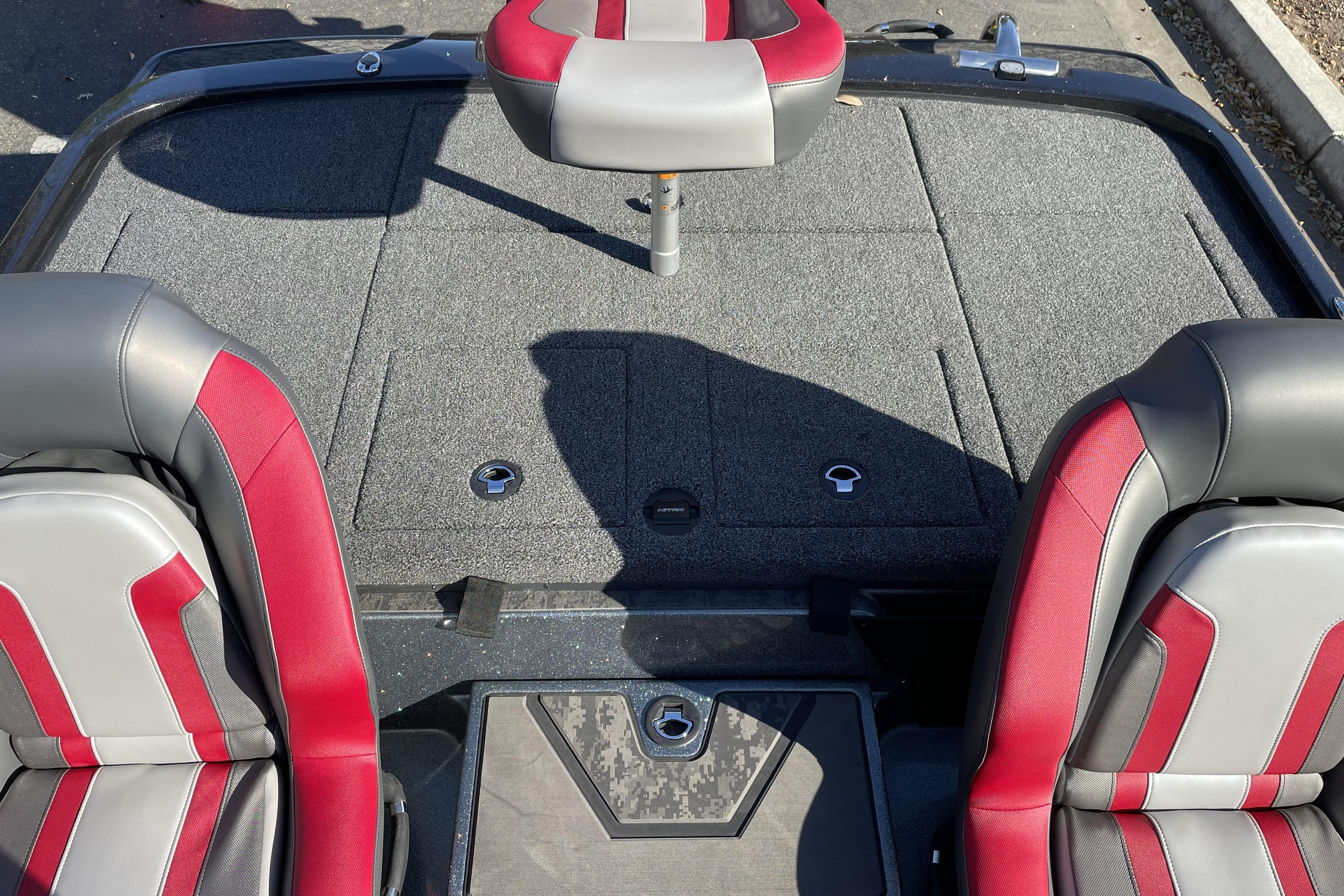 2026 Nitro Z20 XL boat interior with red and gray seats, spacious deck.