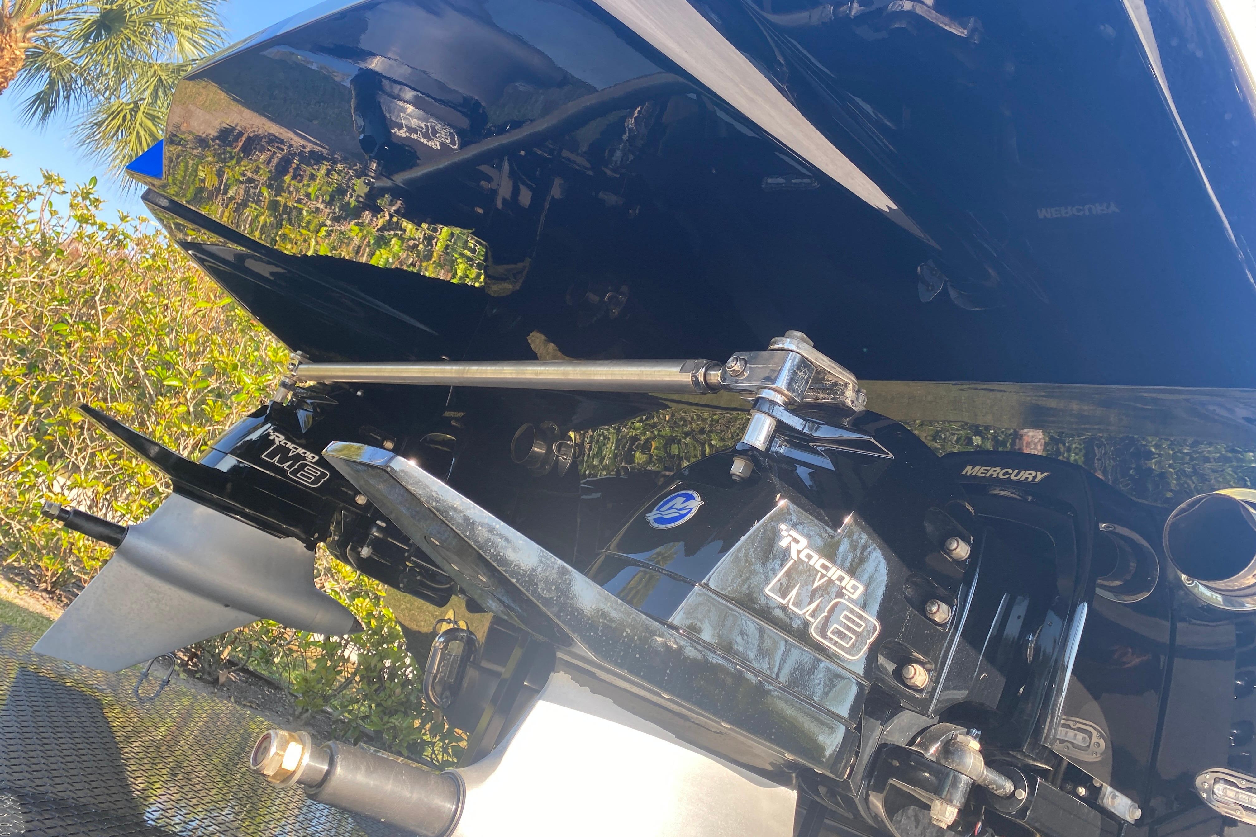 Rear view of a 2016 MTI 44 RP boat with Mercury Racing M8 drives.