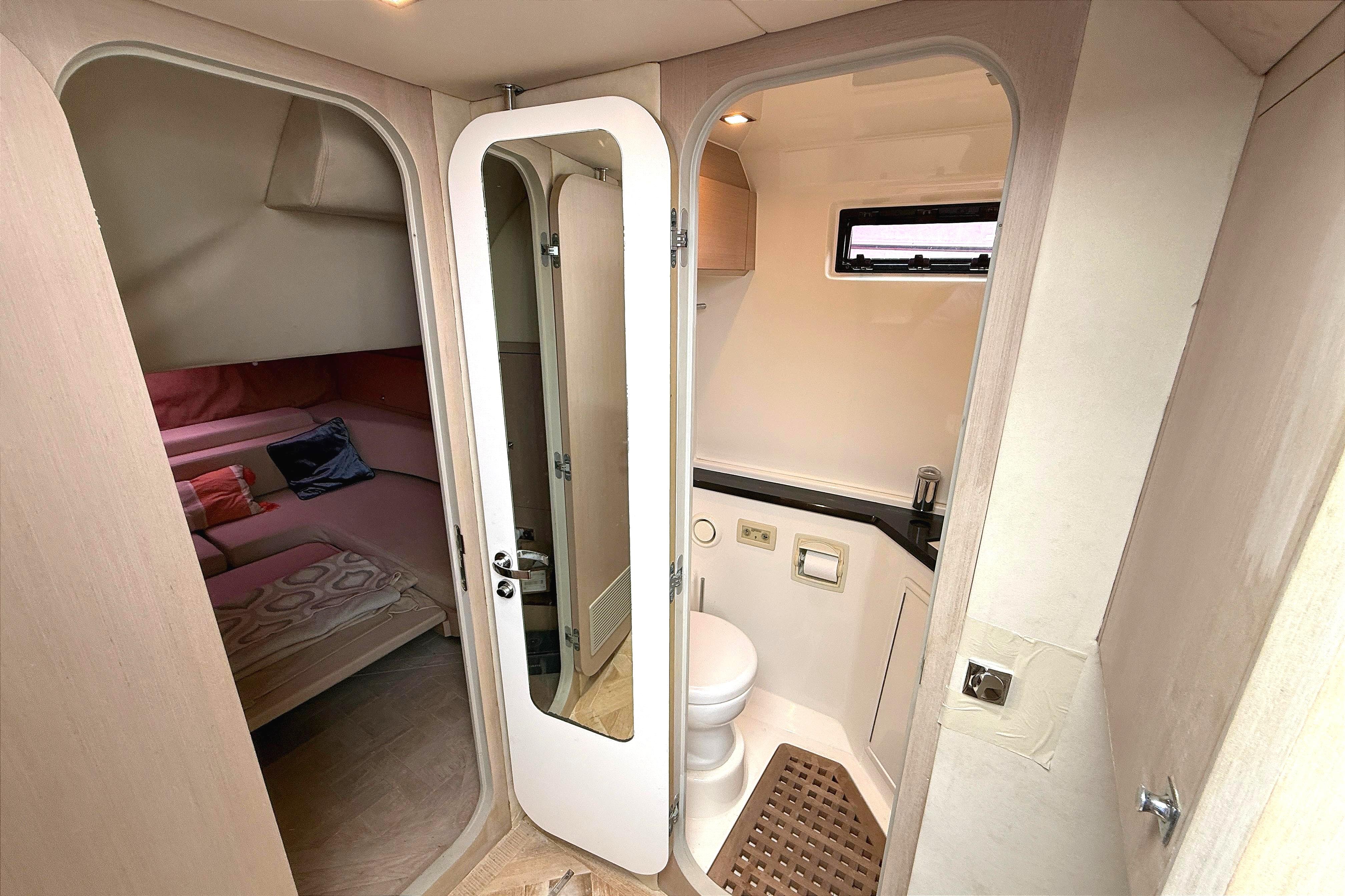 Luxurious bathroom and cozy cabin interior of 2013 Windy SR52 yacht.
