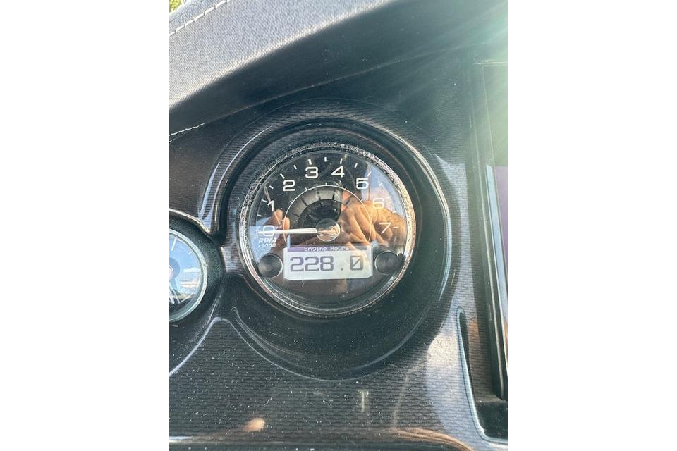 Close-up of 2022 Monterey 255SS Super Sport tachometer displaying 228 engine hours.