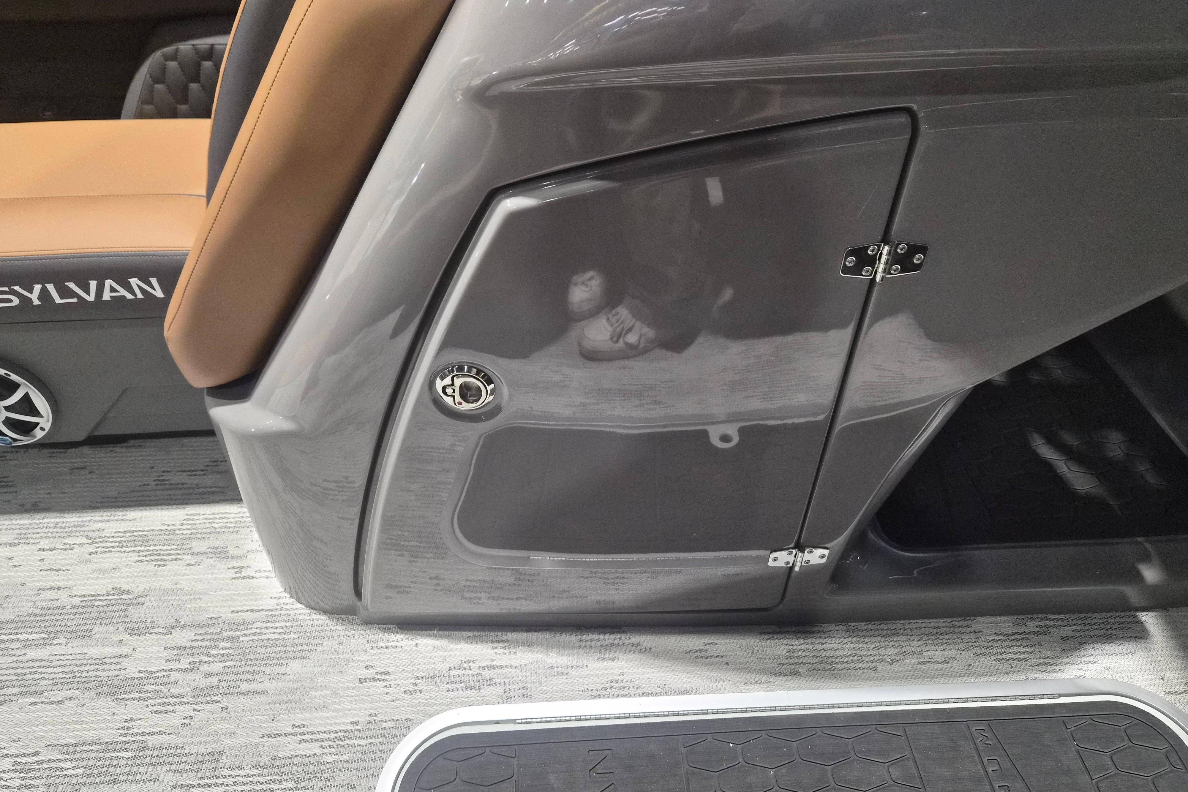 2026 Sylvan L3 SLZ boat interior with sleek gray panel and tan seating.
