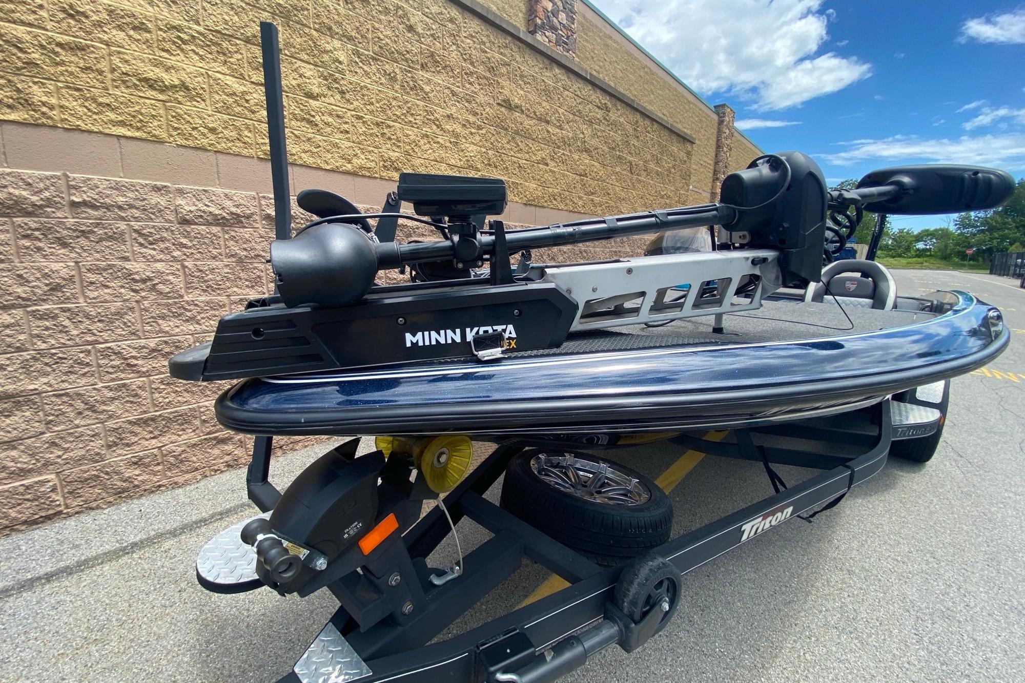 2020 Triton 20 TrX Patriot boat with Minn Kota trolling motor on trailer.