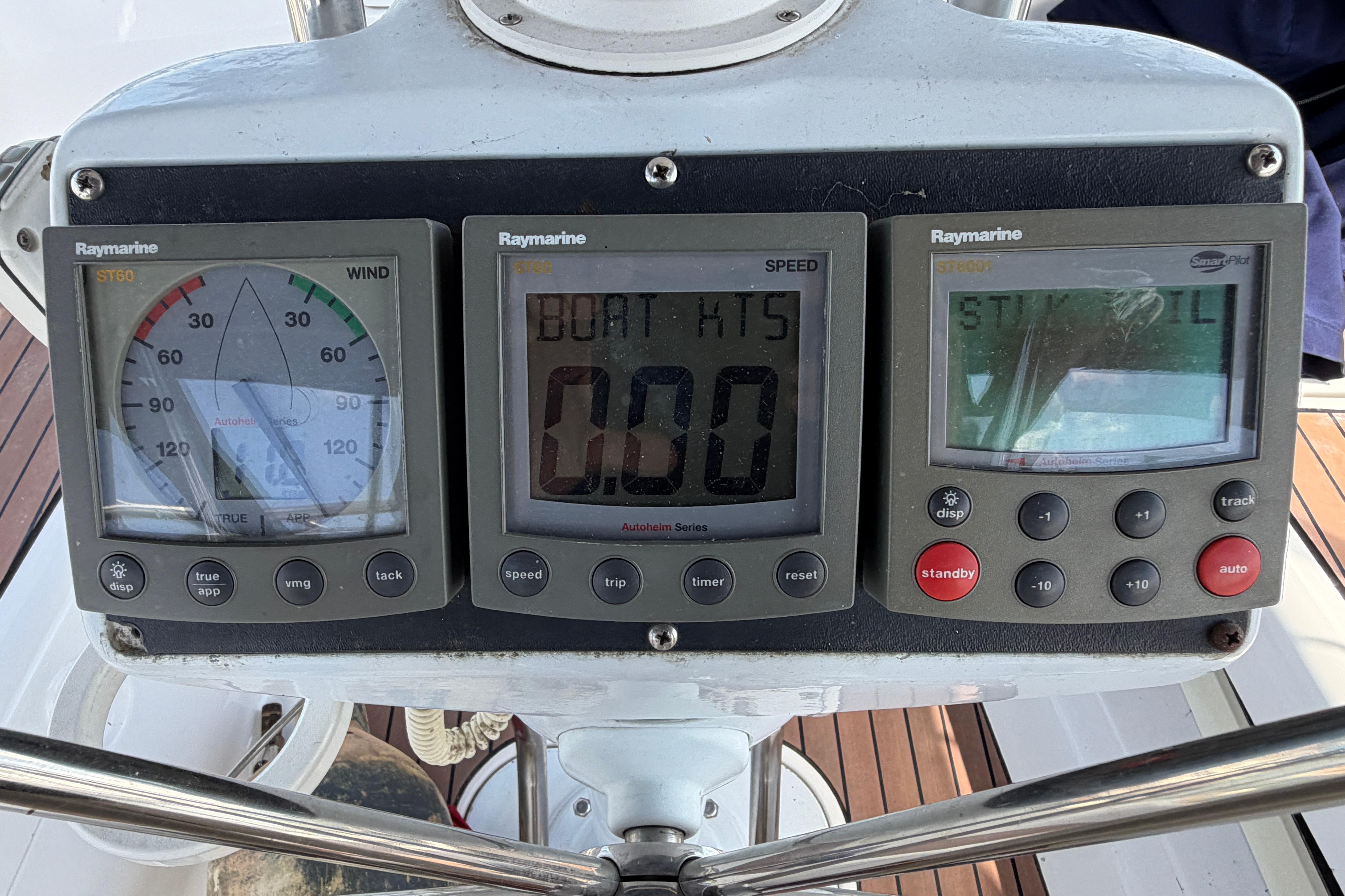 Raymarine navigation instruments on a 2005 Hunter 38 sailboat dashboard.