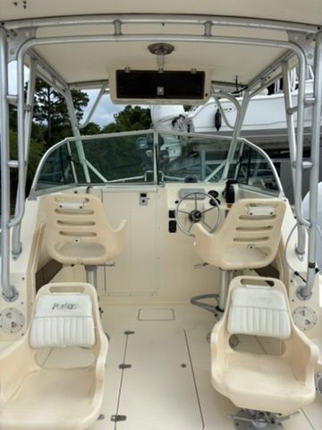 The image shows the cockpit of a 2008 Parker 2310 Walkaround boat with two seats.