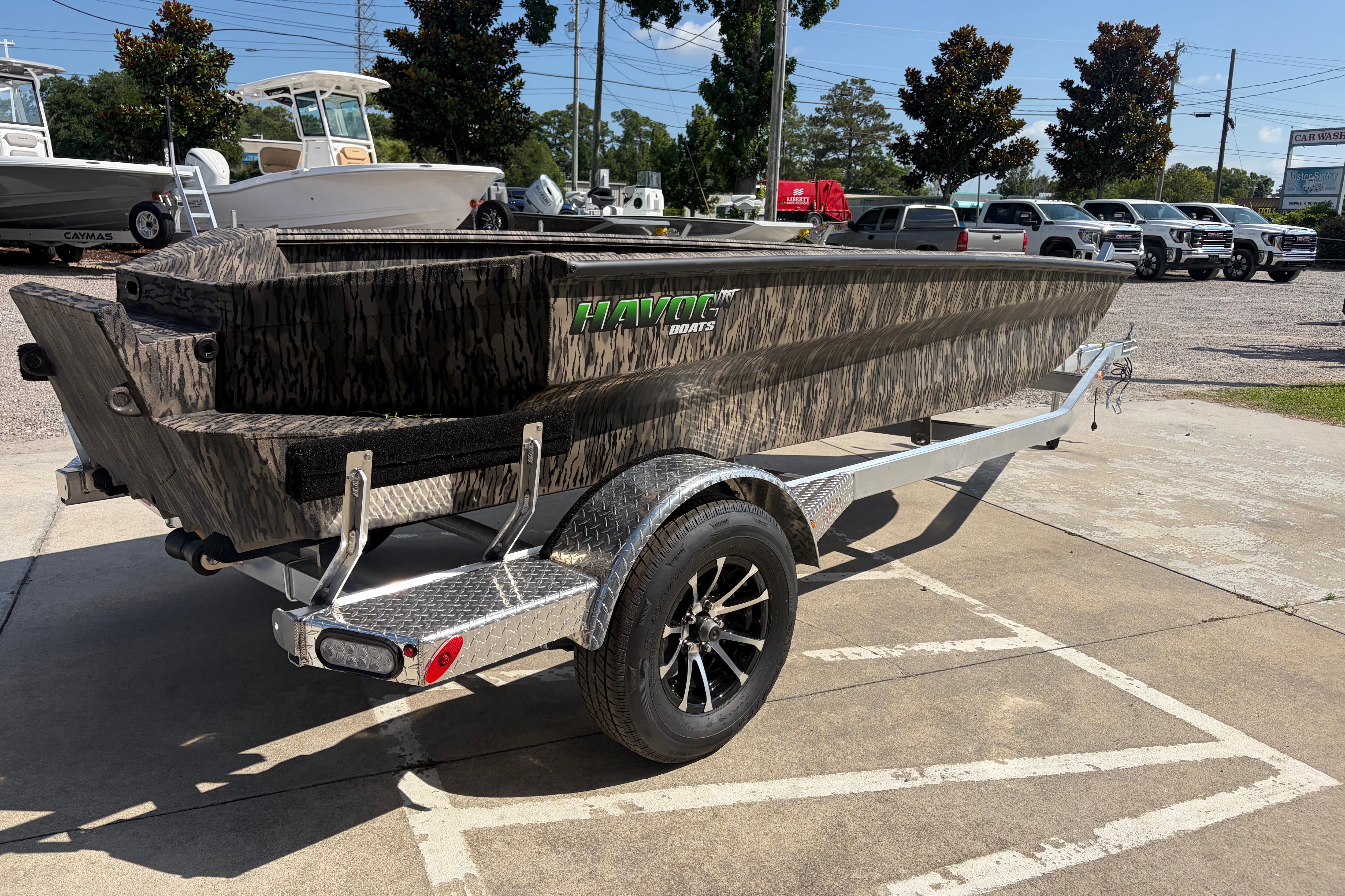 2026 Havoc 1653 VJST boat on trailer, parked outdoors in a dealership lot.