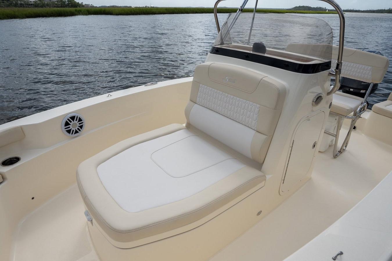 2026 Scout 188 Sportfish boat interior with comfortable seating and sleek design on the water.