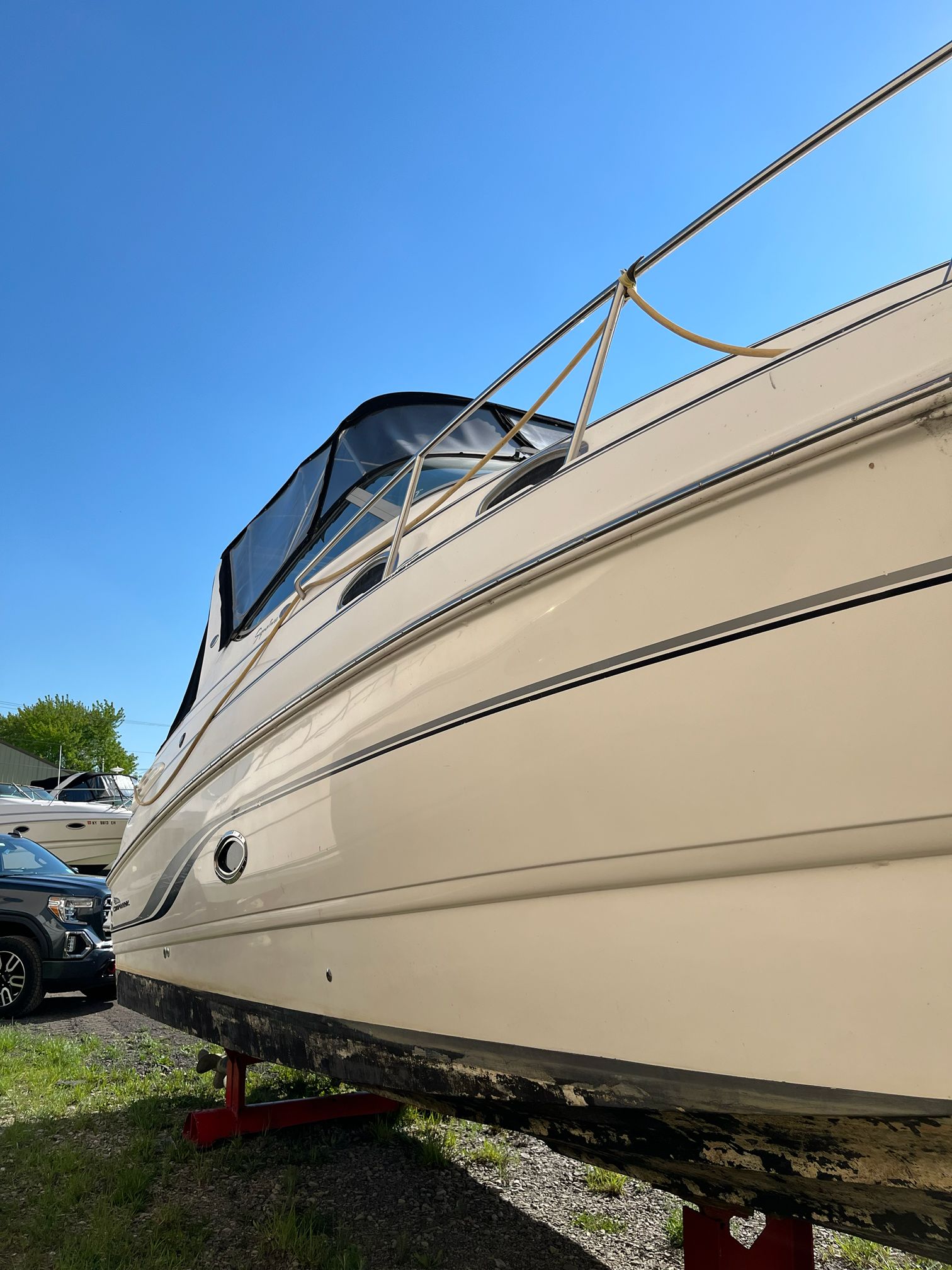 Chaparral Signature 2000 boat on a stand outdoors.