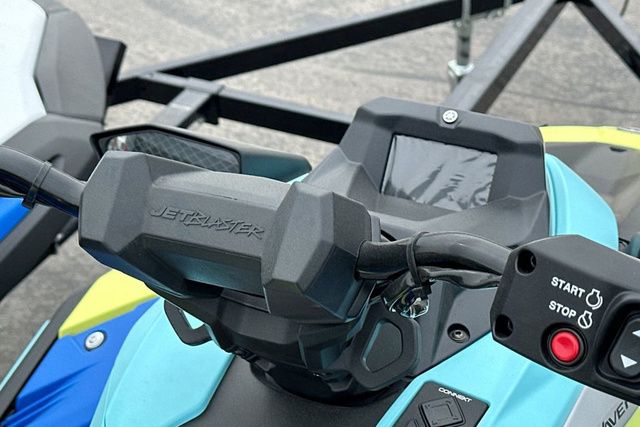 Close-up of a Yamaha WaveRunner Jetblaster handlebar in blue and yellow.