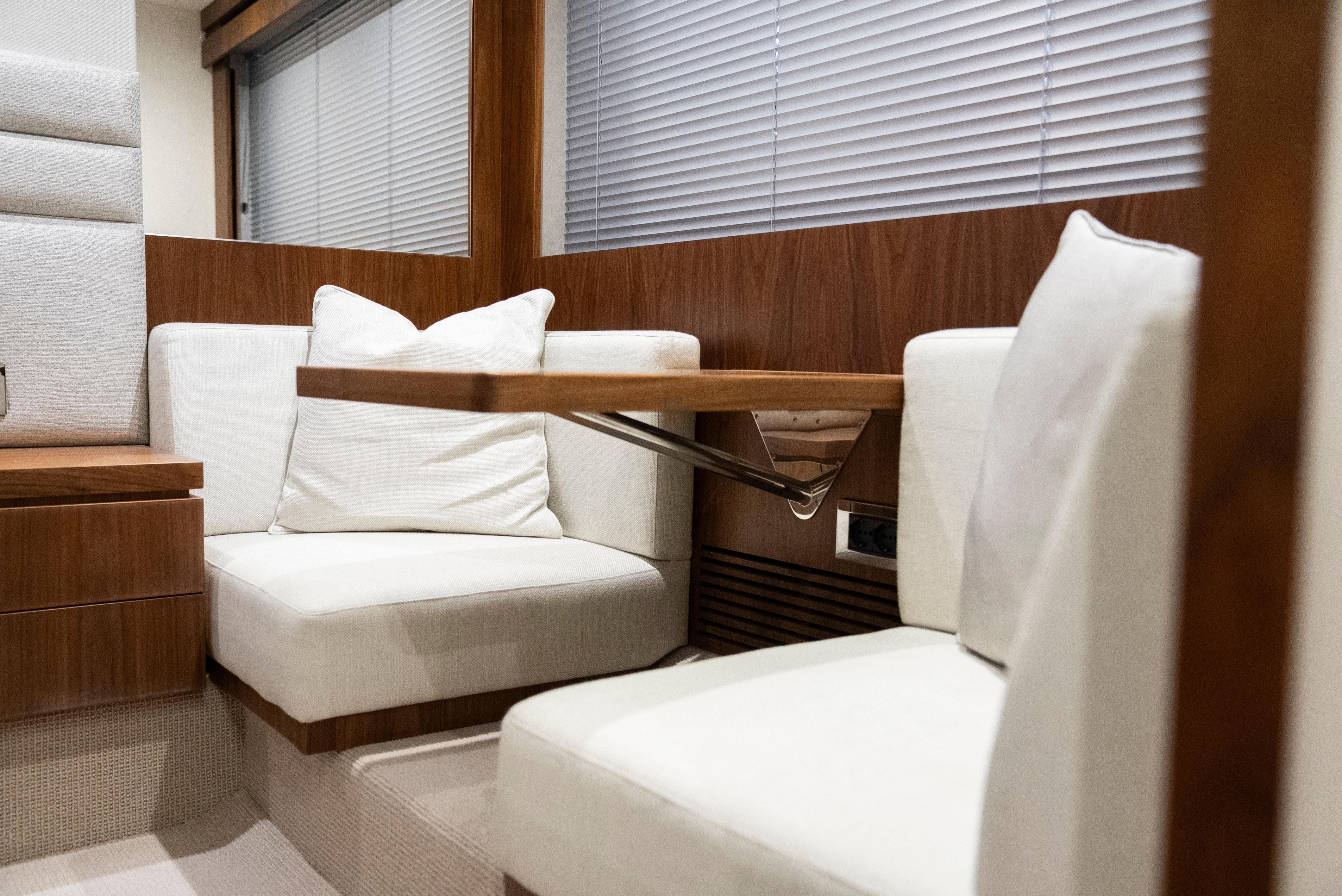 Luxurious interior seating area on 2017 Sunseeker Manhattan 66 yacht.