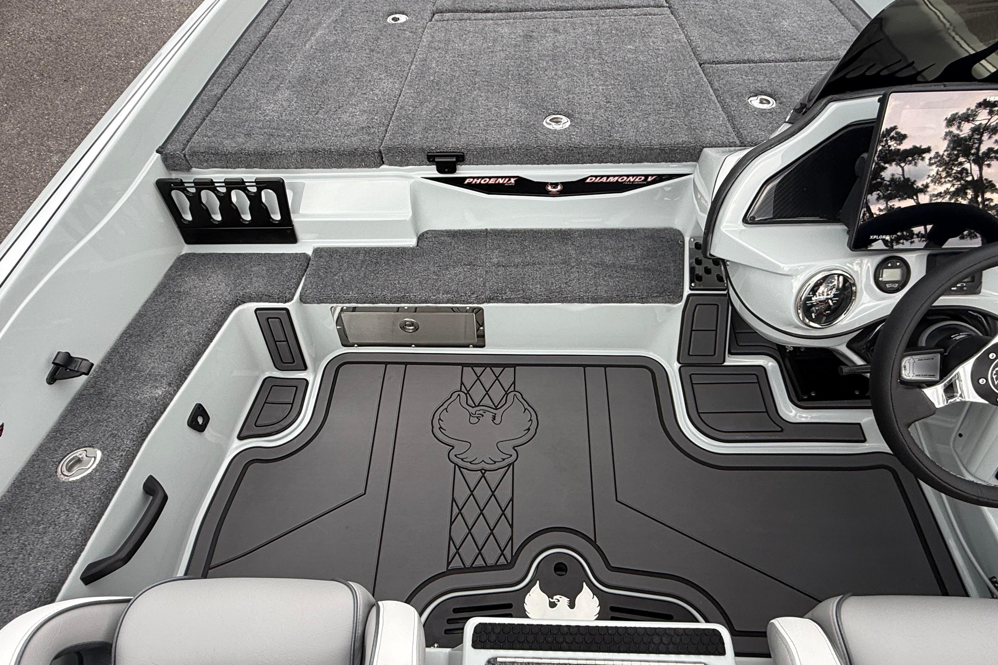 Interior of 2027 Phoenix 921 Elite X II boat with sleek design and advanced controls.