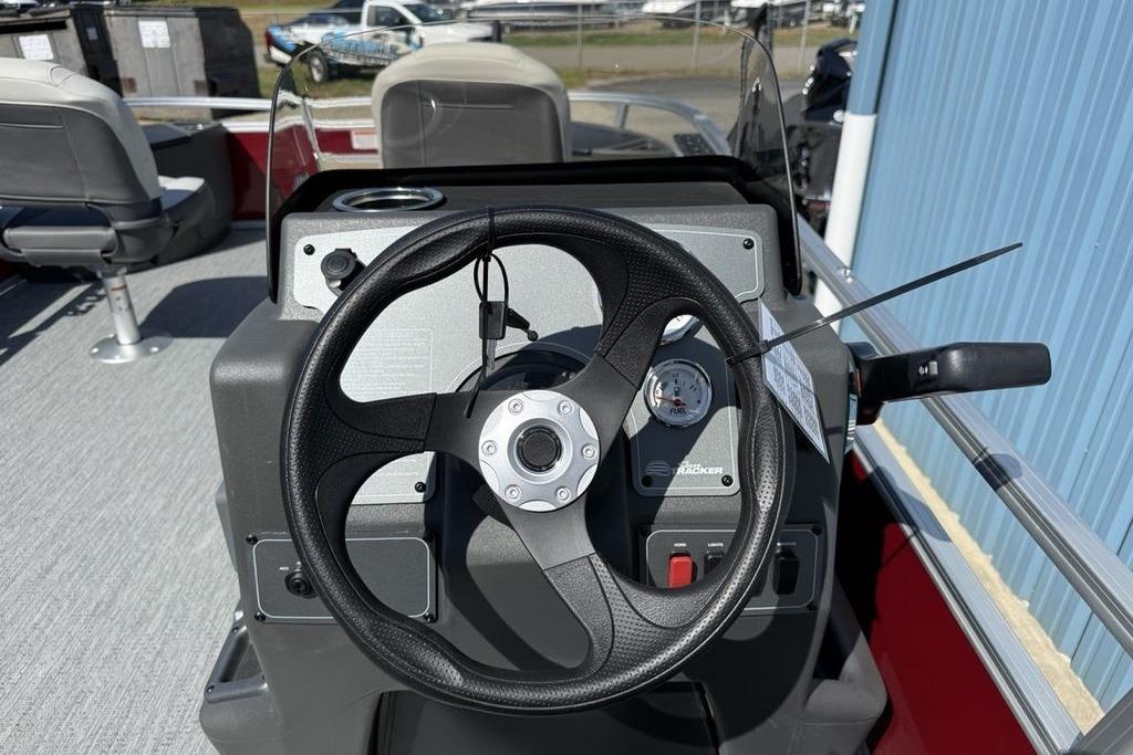 Steering console of 2026 Sun Tracker Bass Buggy 18 DLX pontoon boat.