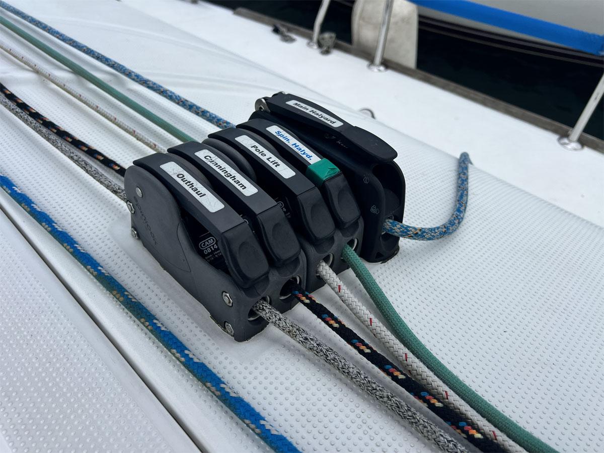 Sailing ropes and cam cleats on a 2001 Beneteau First 40.7 yacht deck.