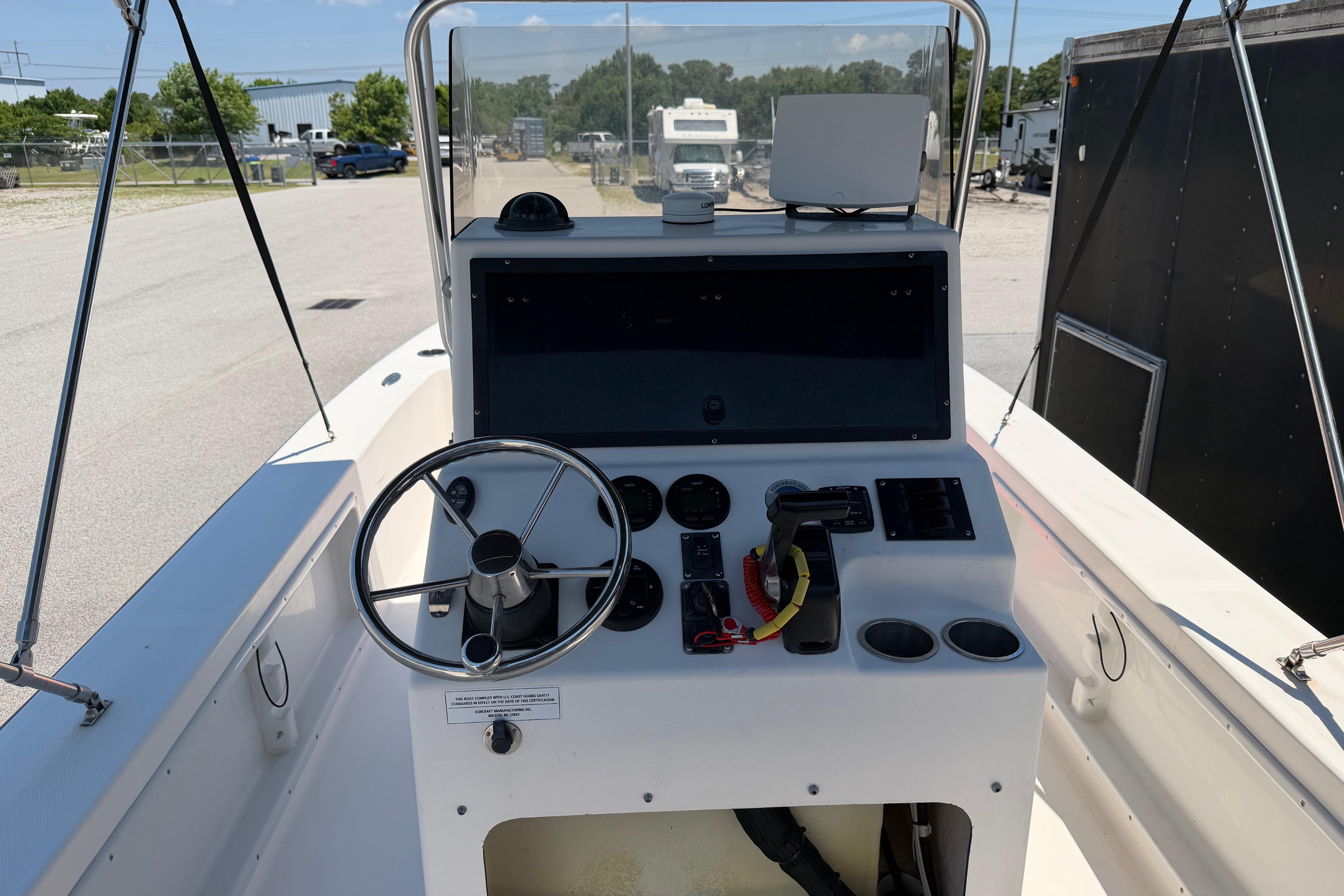 2008 KenCraft Bay Rider 2060 boat console with steering wheel and controls.