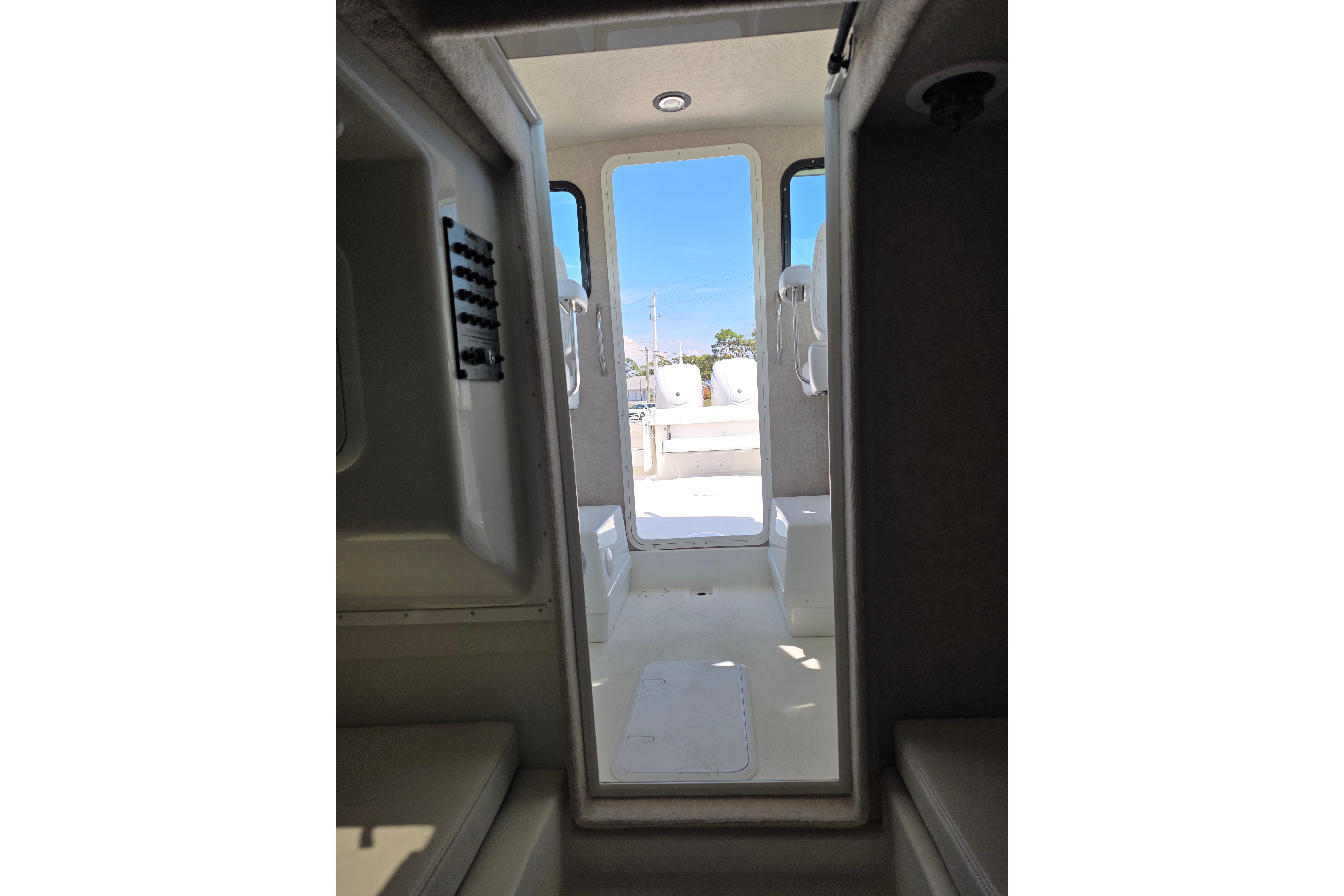 Interior view of 2026 Parker 287 Explorer boat, showcasing cabin and deck access.