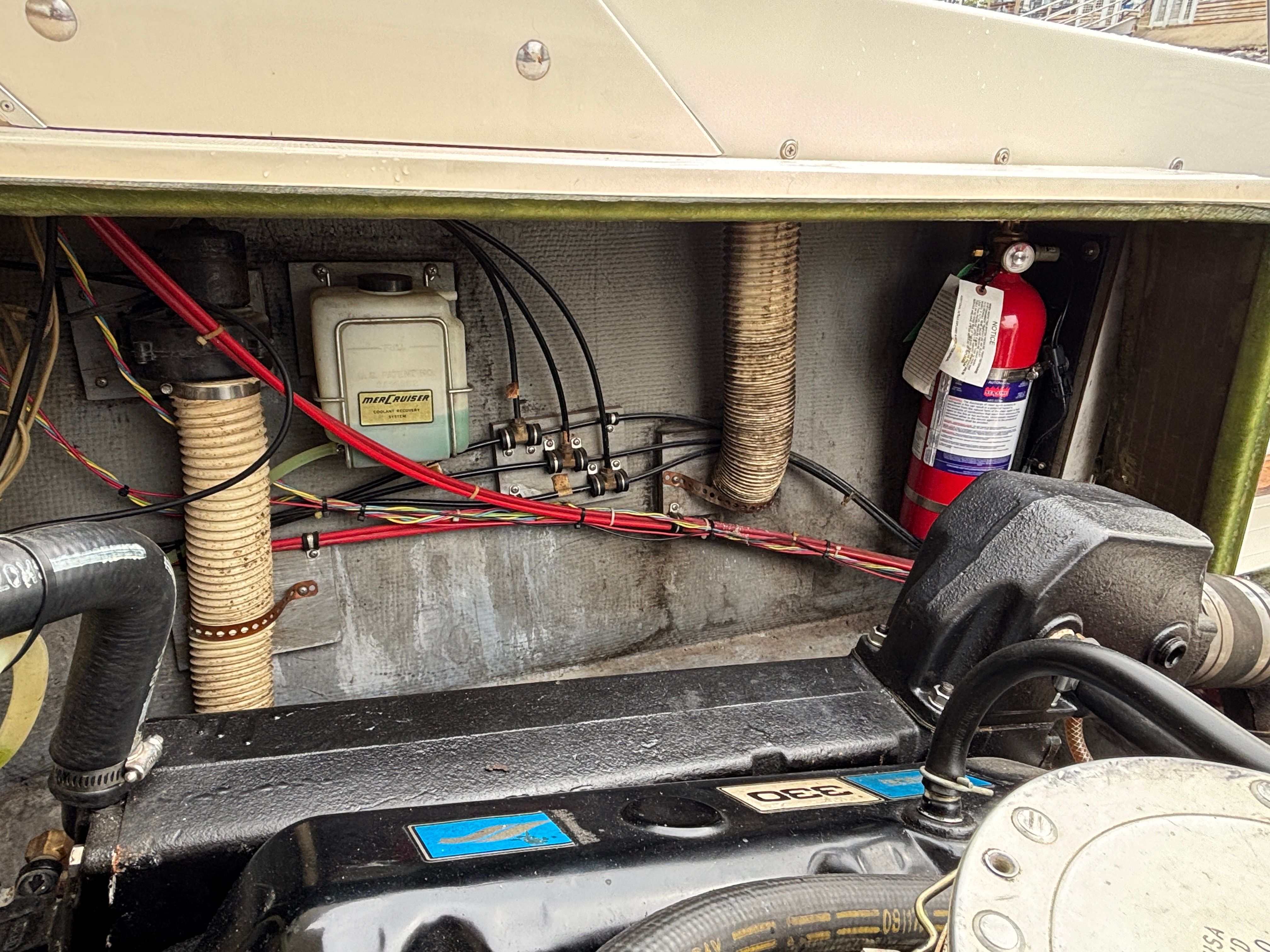 Interior view of a 1978 Bertram MOPPIE boat engine compartment.