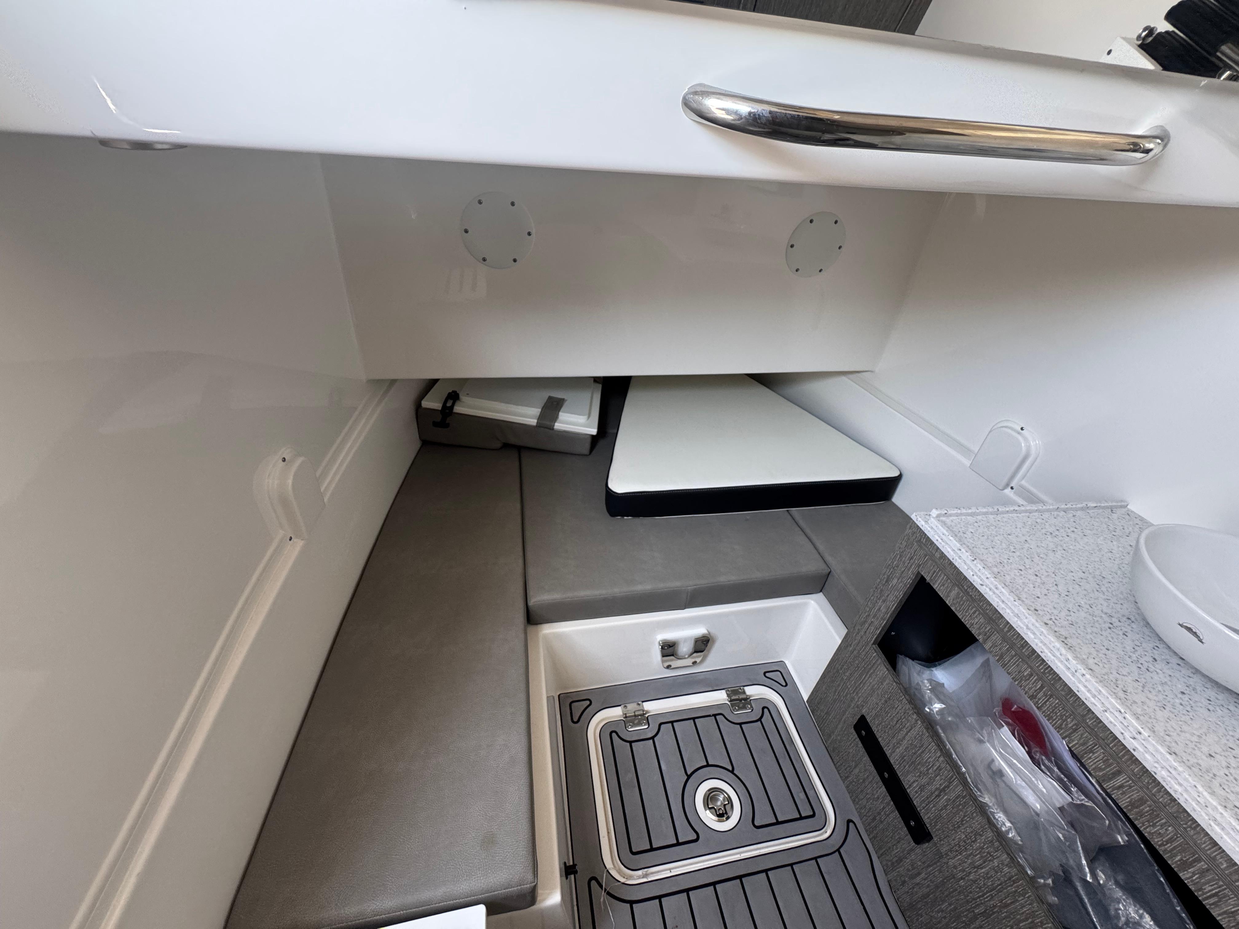 2024 Tidewater 380 CC Adventure cabin interior with seating and storage.