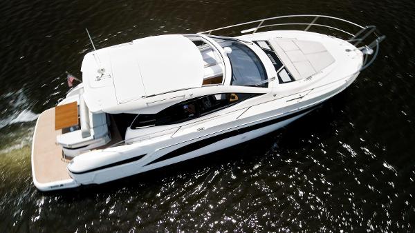 2022 Bavaria SR41 yacht cruising on water, aerial view.