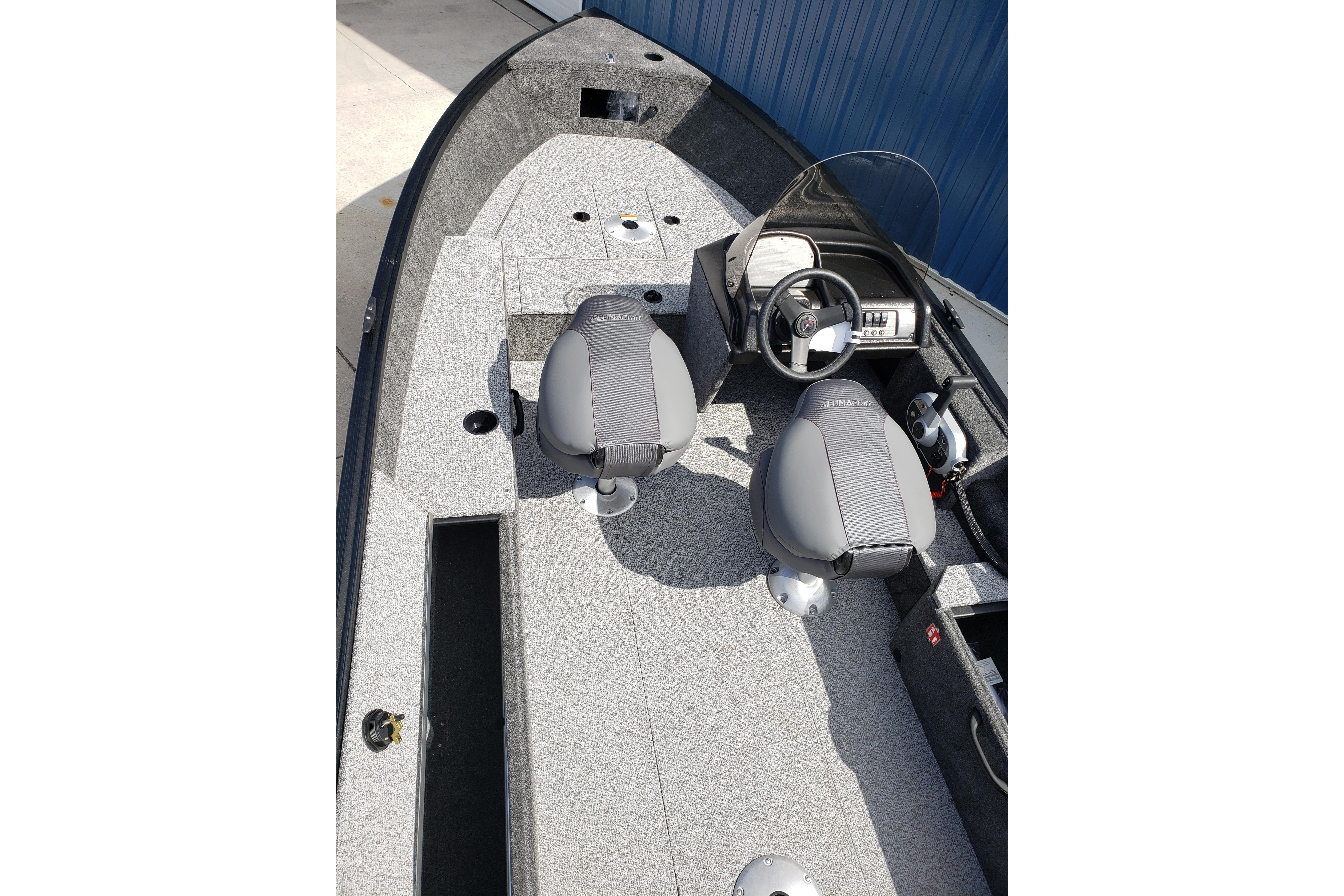 2026 Alumacraft Escape 165 CS boat interior with dual seats and steering console.