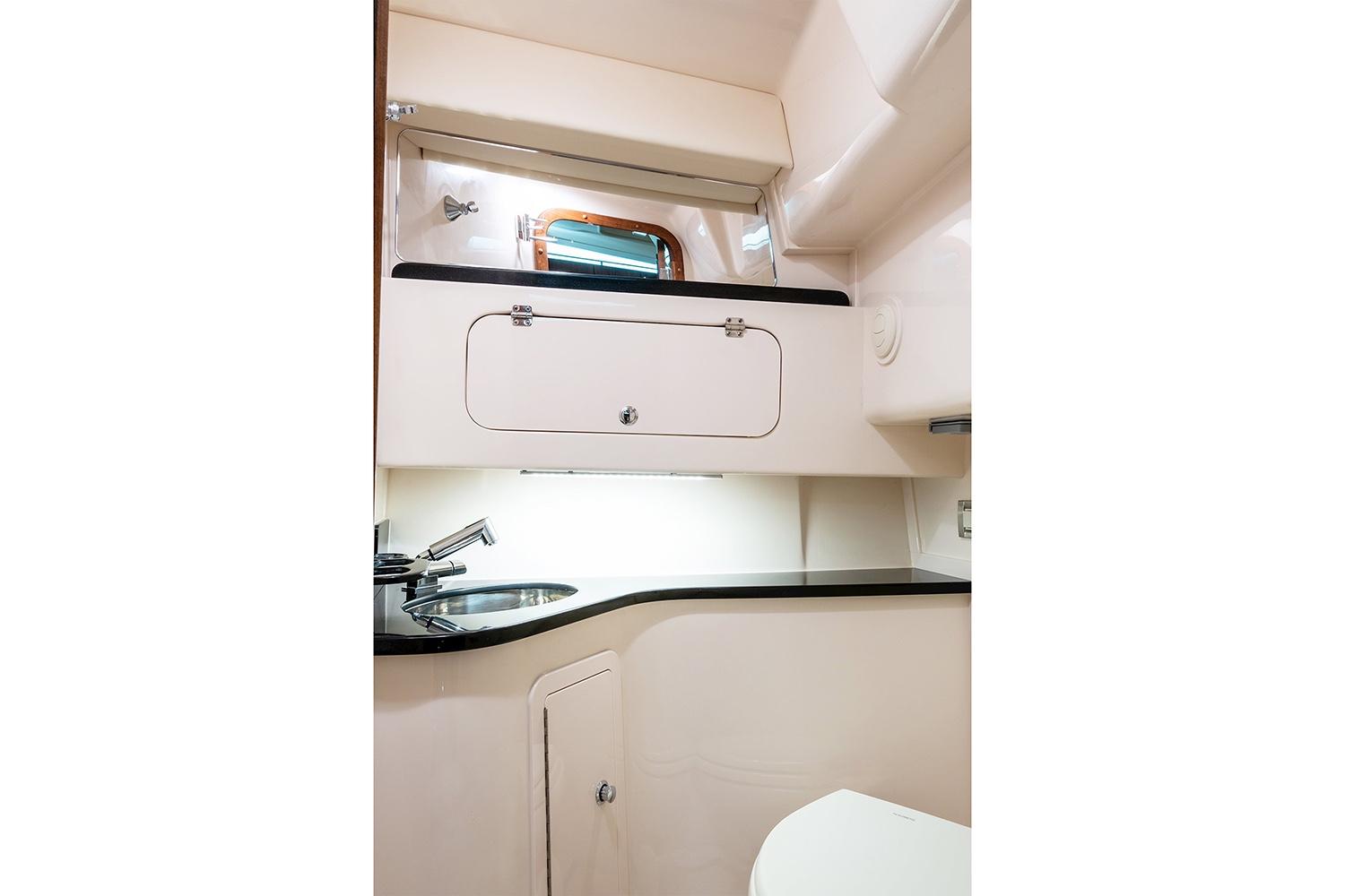 Manufacturer Provided Image: 2021 Grady-White Express 330 boat interior with sink and storage.