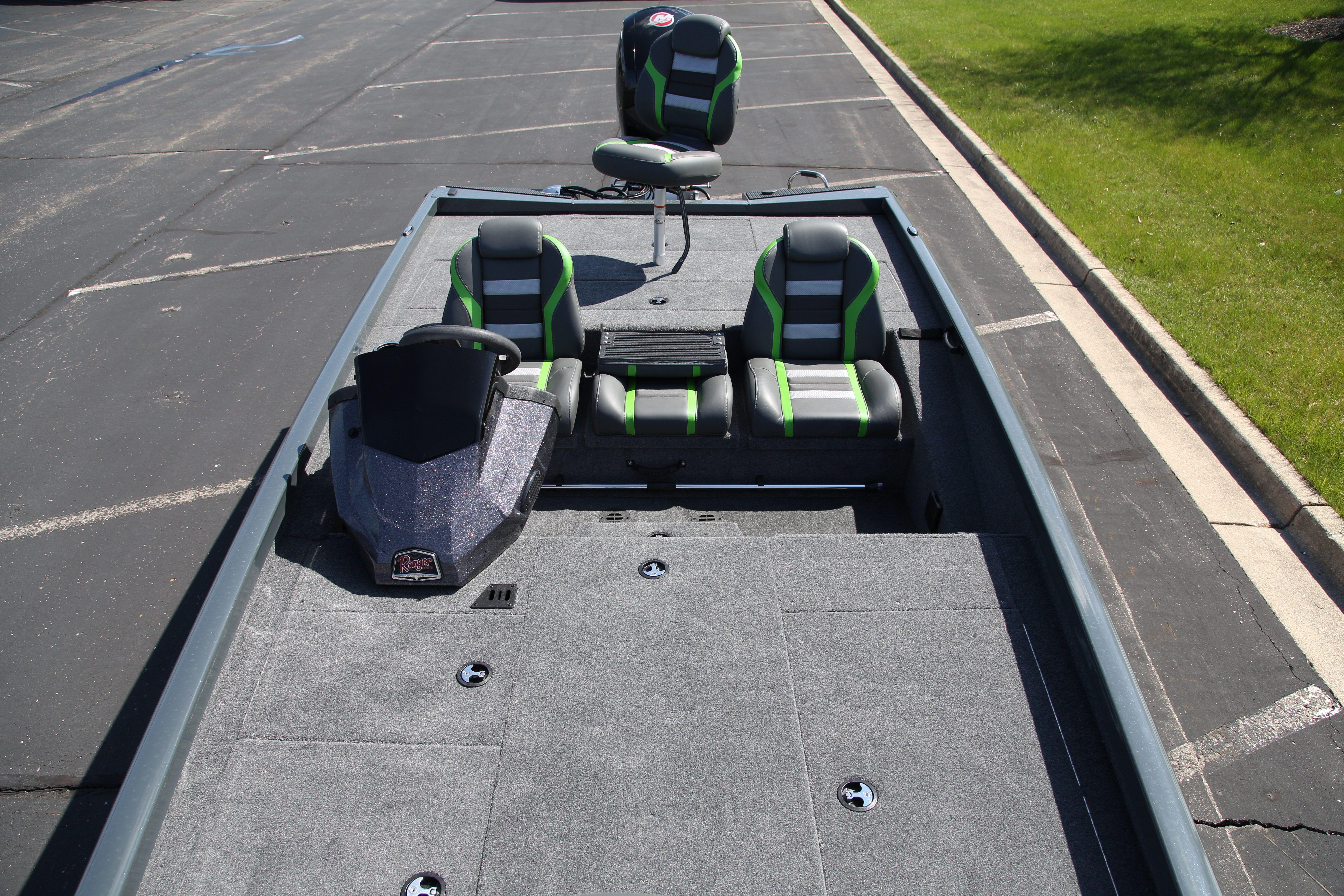 2026 Ranger RT198P boat interior with green-accented seats and spacious deck.
