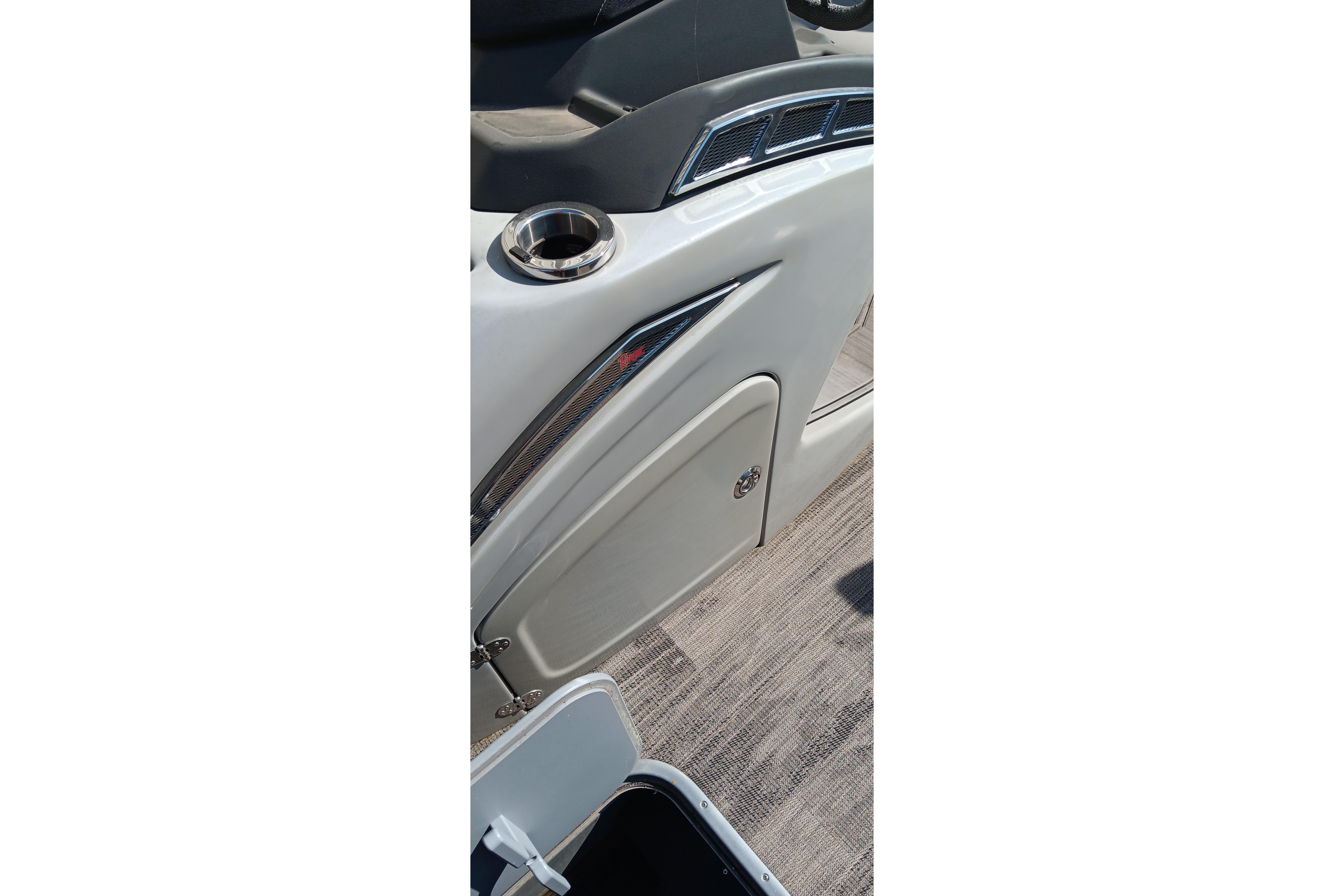 2023 Ranger 2500LS boat interior with cup holder and storage compartment.
