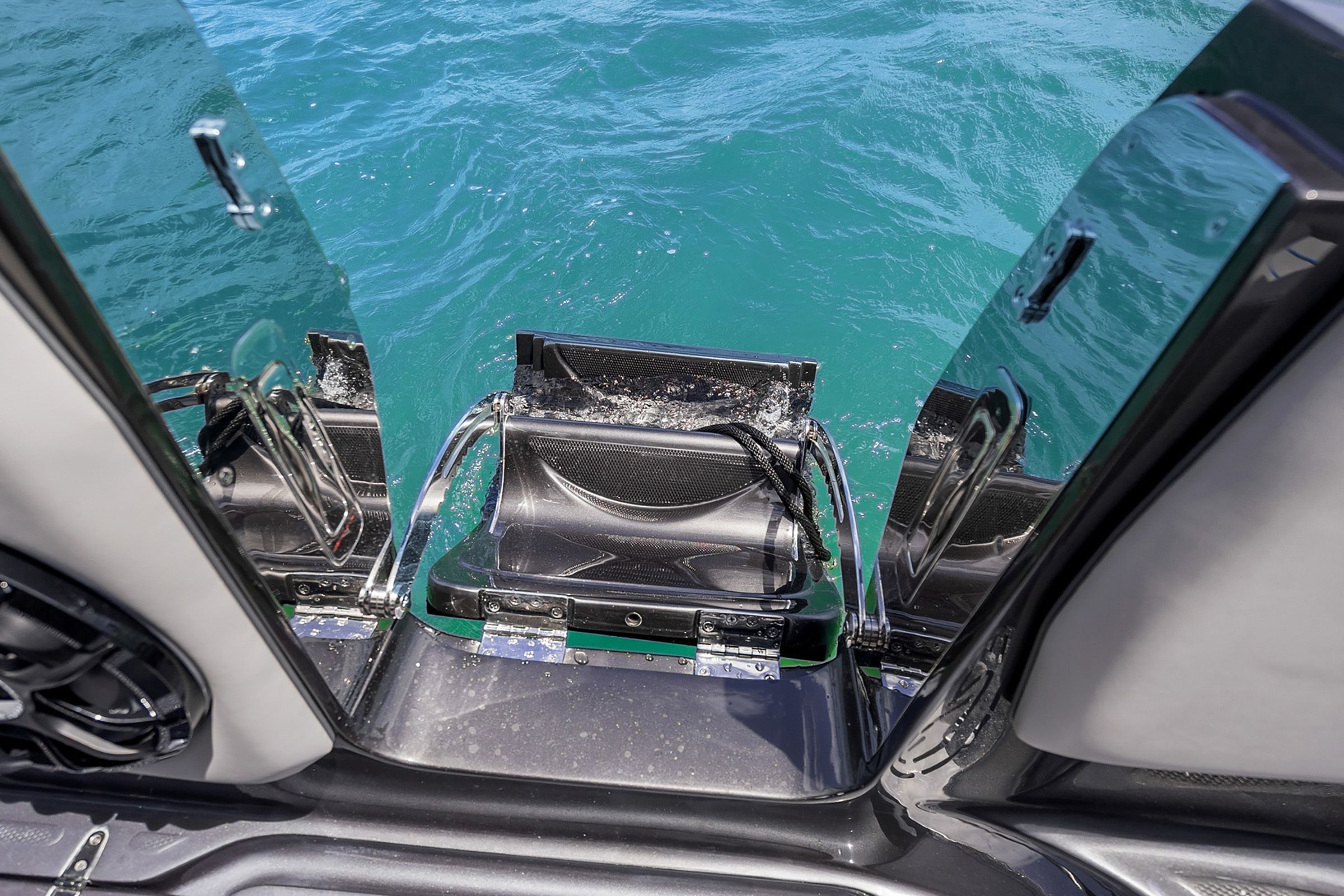 Renegade Open 42 boat door overlooking water, model year 2027.