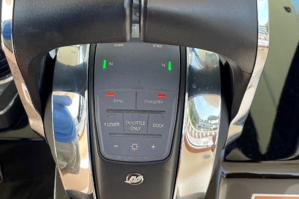Control panel of a 2020 Scout 420 LXF boat with various function buttons.
