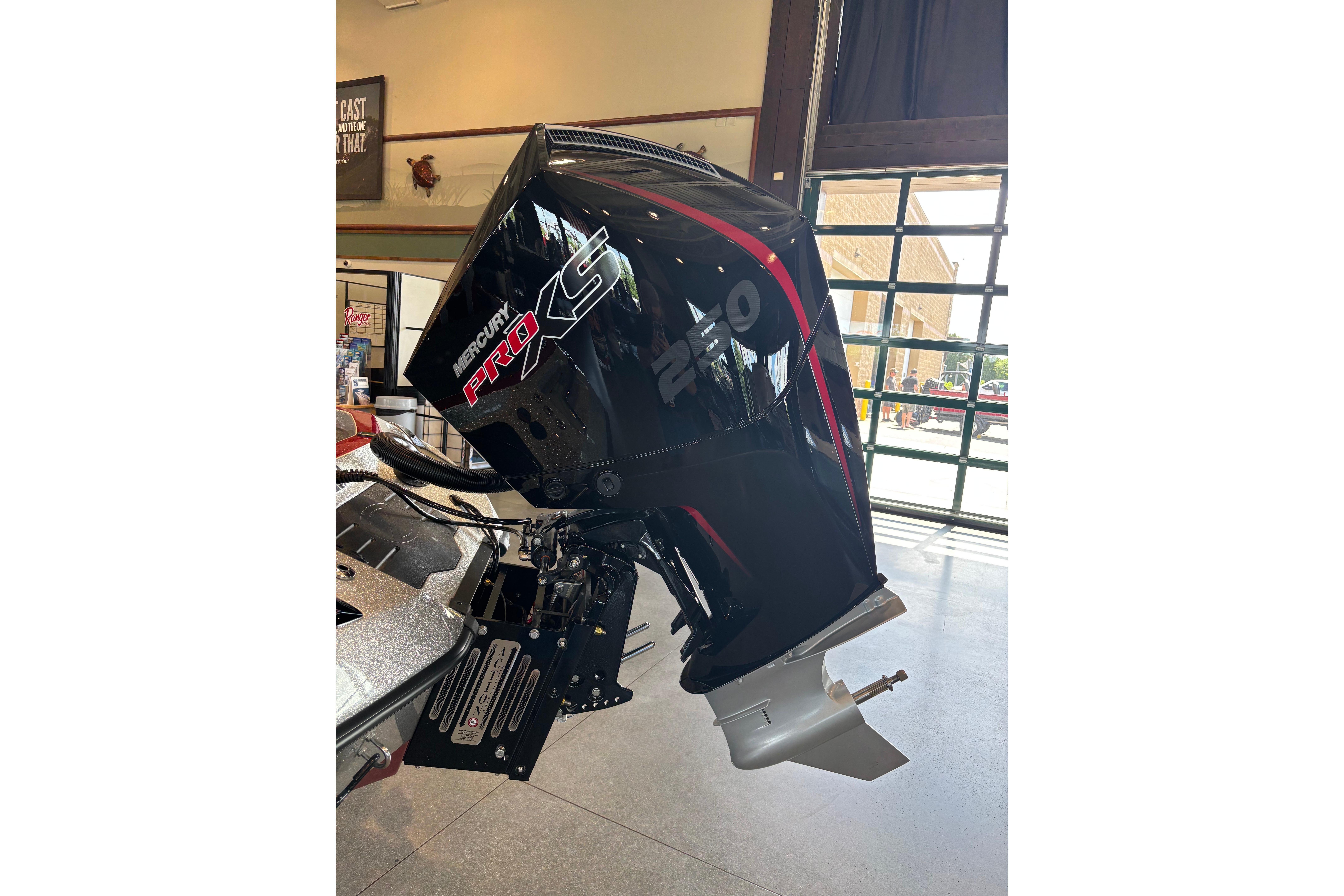 2026 Ranger Z520R Cup-Equipped boat with Mercury Pro XS engine in showroom.