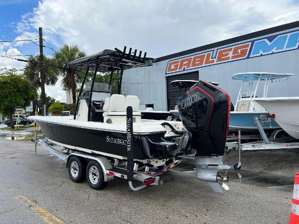 2024 ShearWater 260 Carolina Flare boat on trailer, parked outdoors.