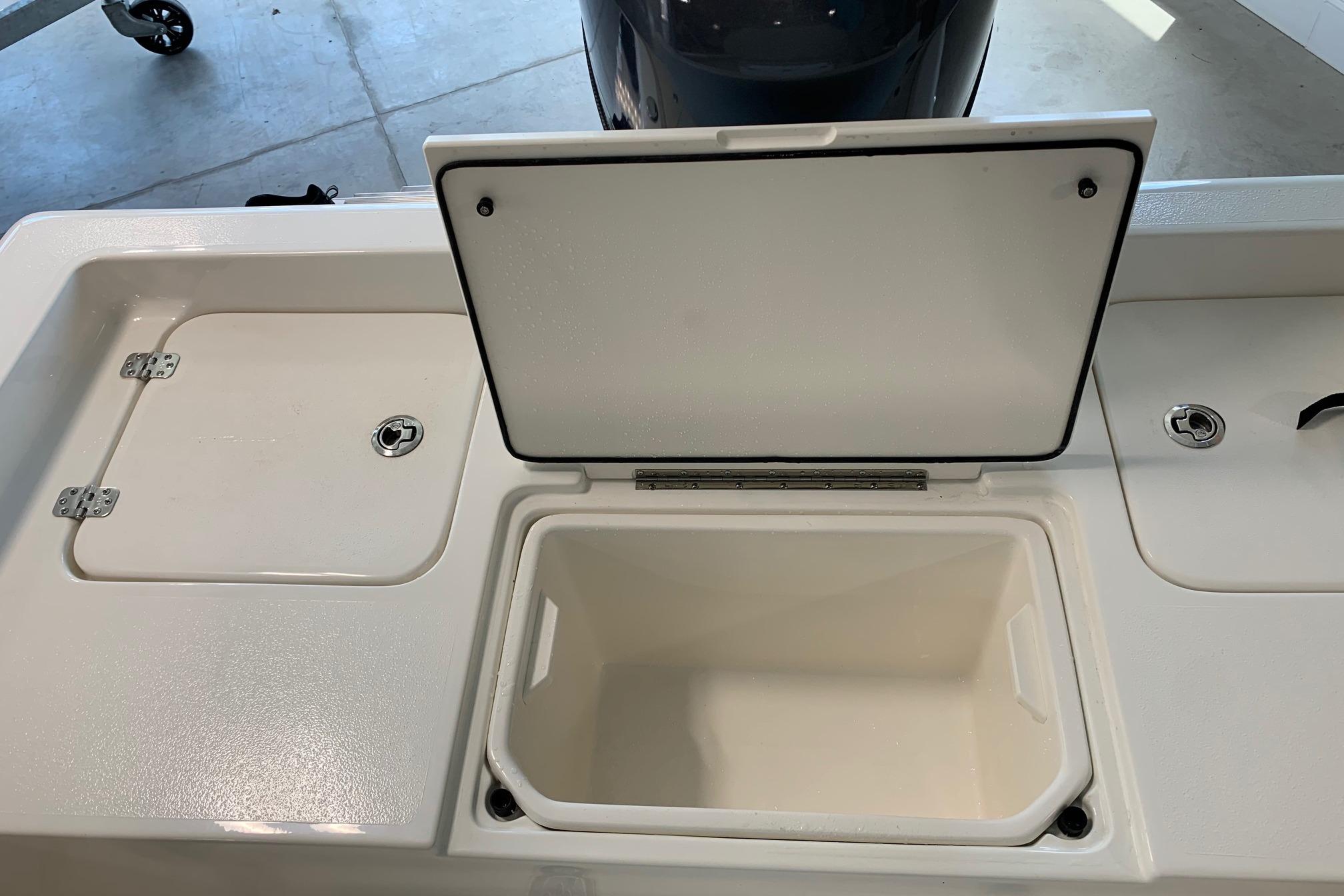 Open storage compartment on 2026 Key West 188 Bay Reef boat.