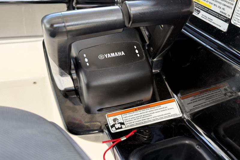 Close-up of 2017 Yamaha SX210 boat throttle control panel.