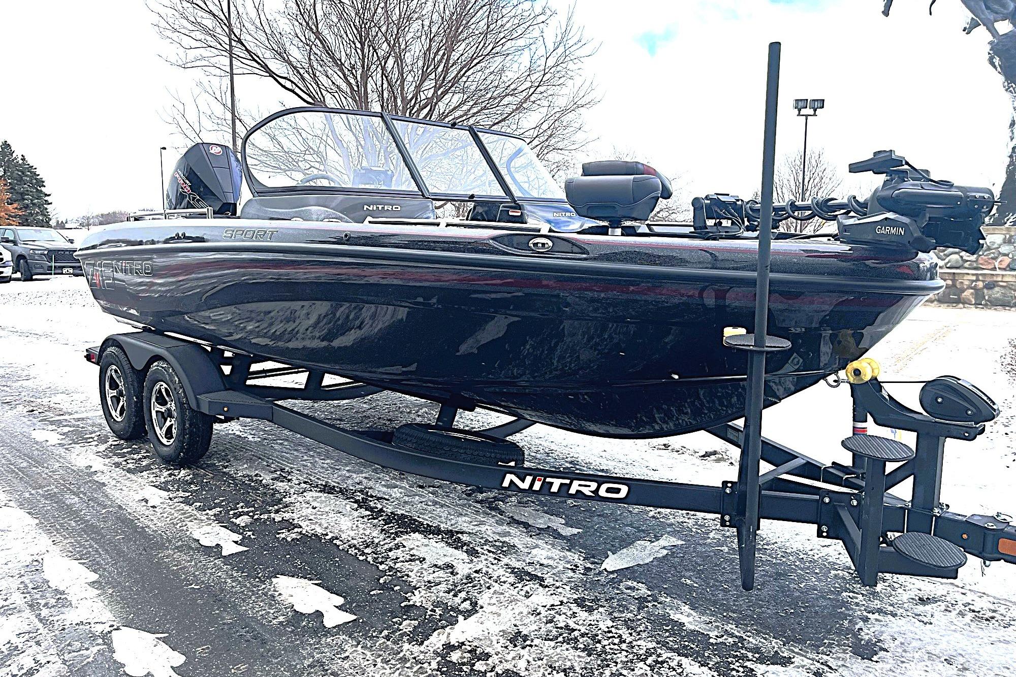 2026 Nitro ZV19 Sport Pro boat on trailer in snowy setting.