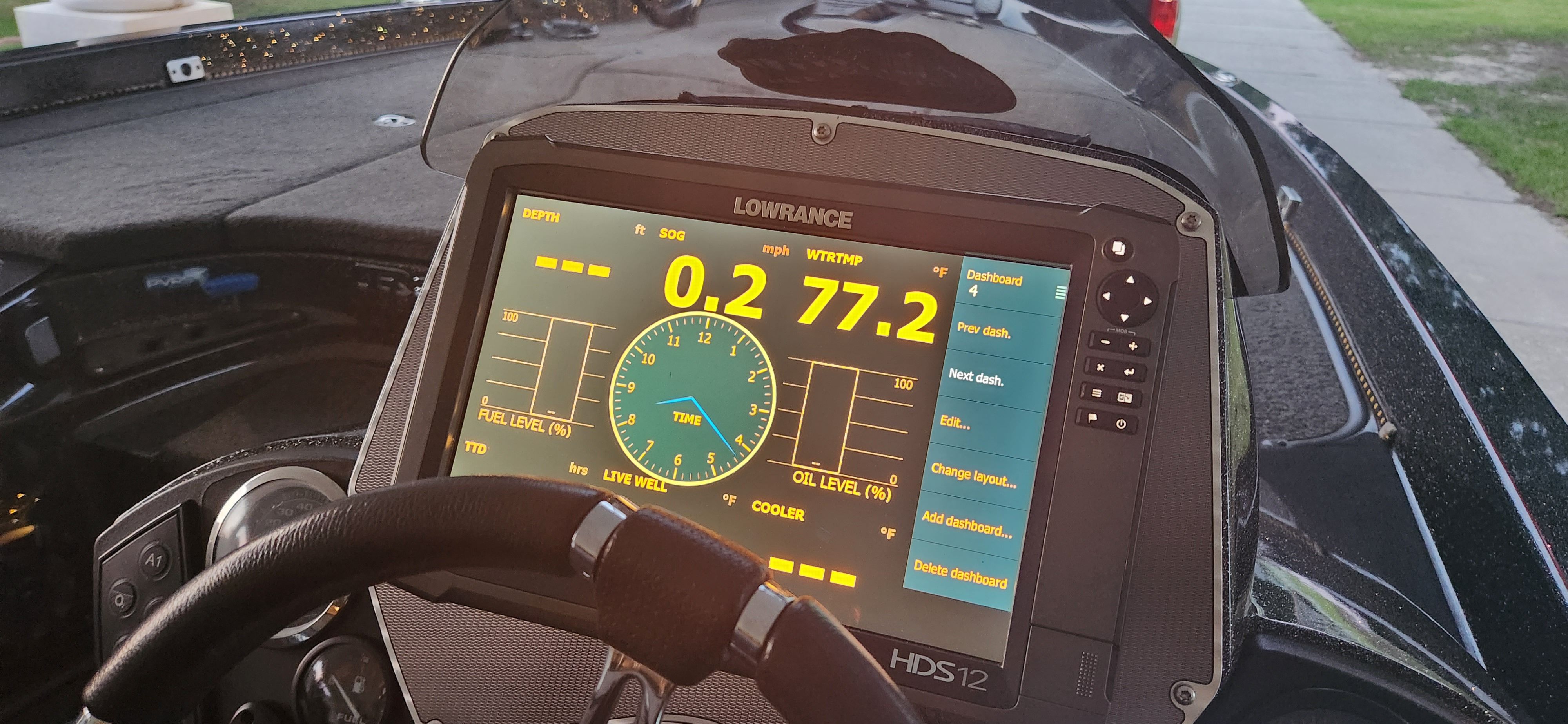 The image shows a Lowrance HDS12 display on a Ranger Z520 Comanche boat.