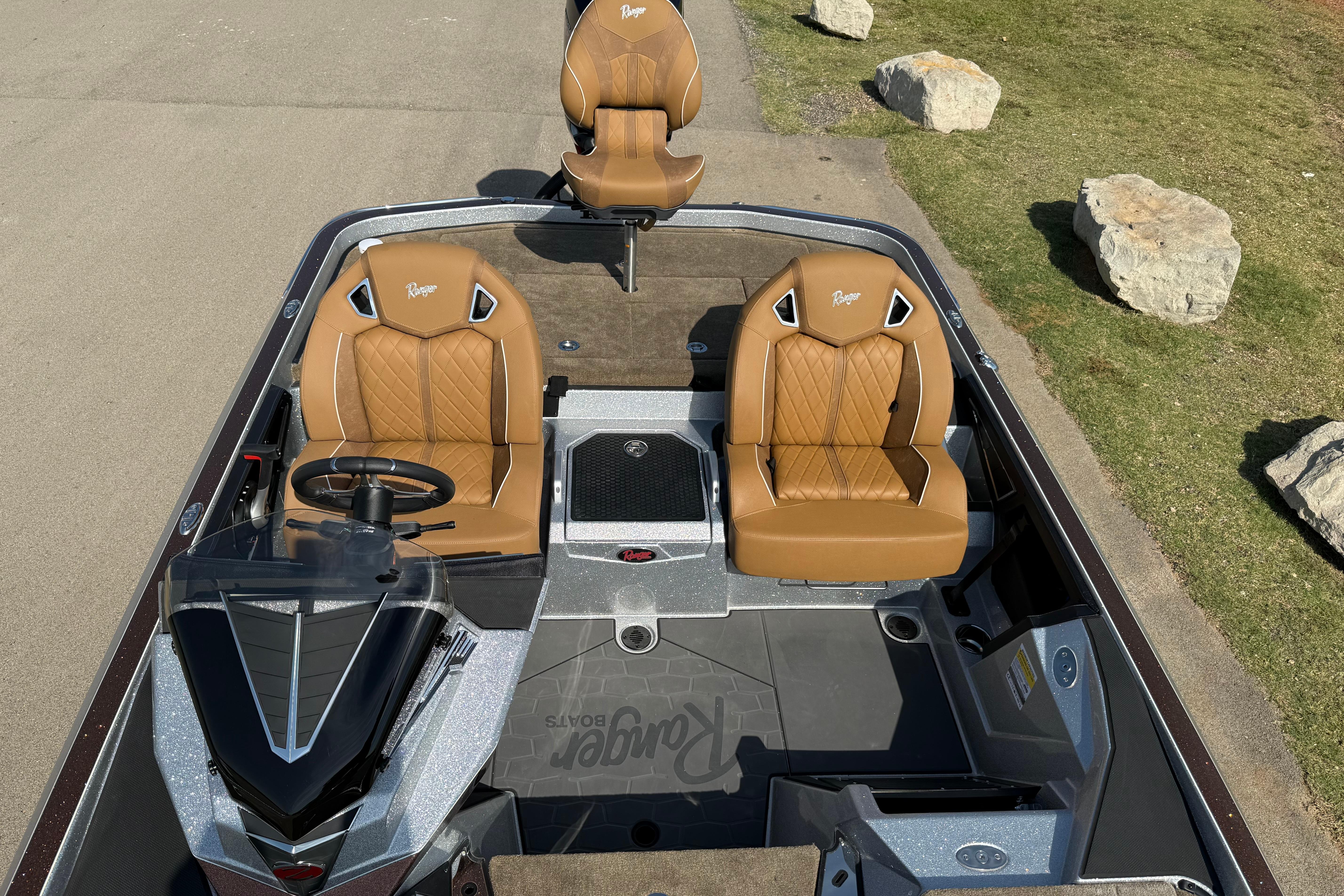 2026 Ranger Z521R boat interior with tan seats and modern dashboard design.
