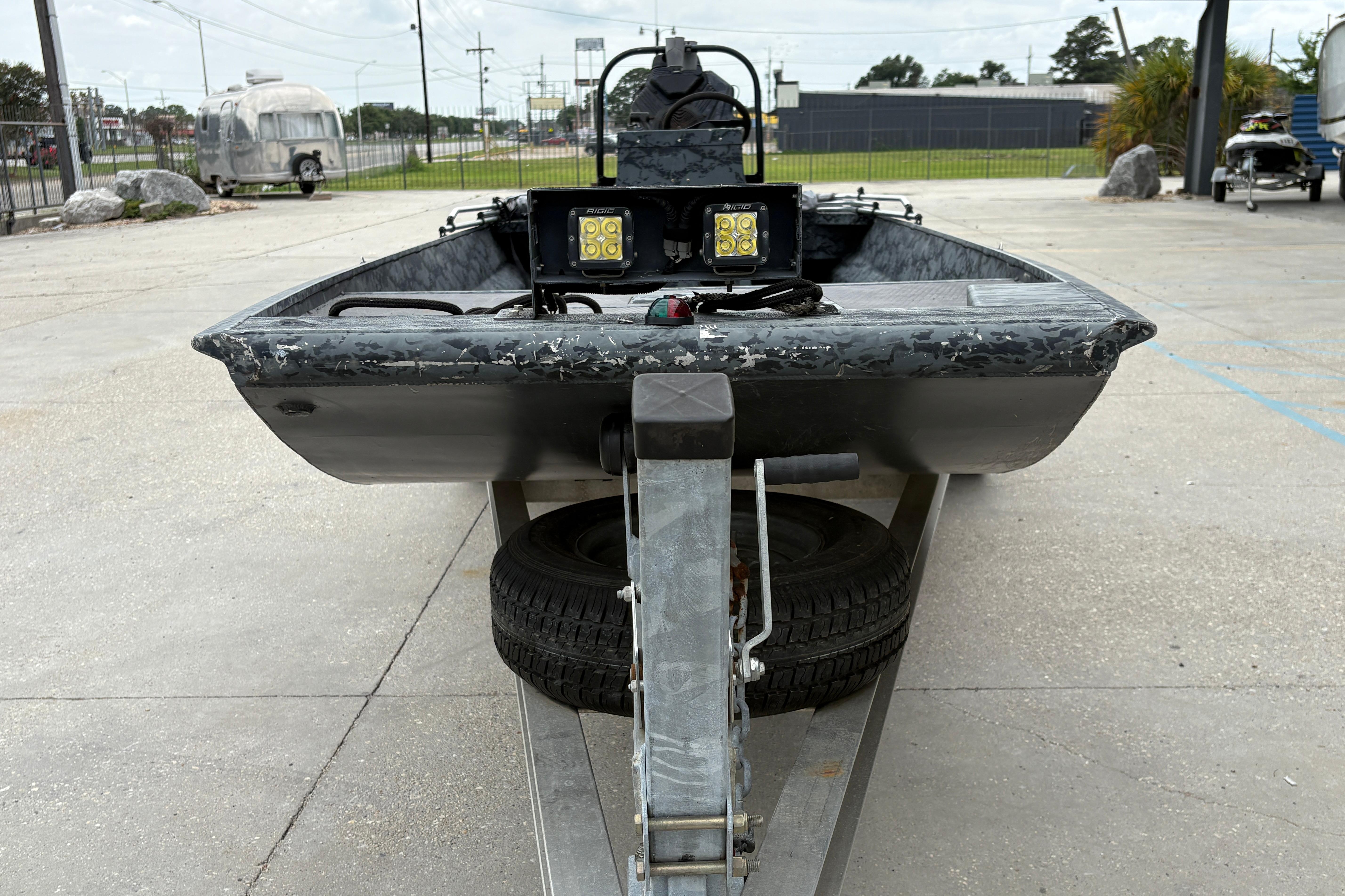 2020 Gator Tail Extreme boat on trailer, featuring dual LED lights, parked outdoors.