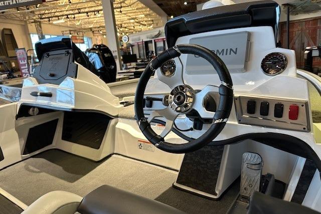 2026 Nitro Z19 XL Pro boat interior with steering wheel and control panel.
