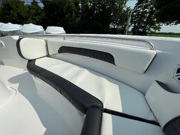 2025 Tidewater 232 CC Adventure boat interior with sleek white and black seating.