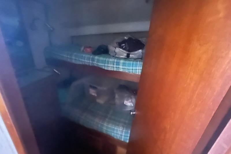 Interior of 1987 Topaz 44 Sportfisherman with bunk beds.