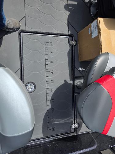 2025 Nitro ZV-20 SPORT boat interior with measuring ruler and seating.