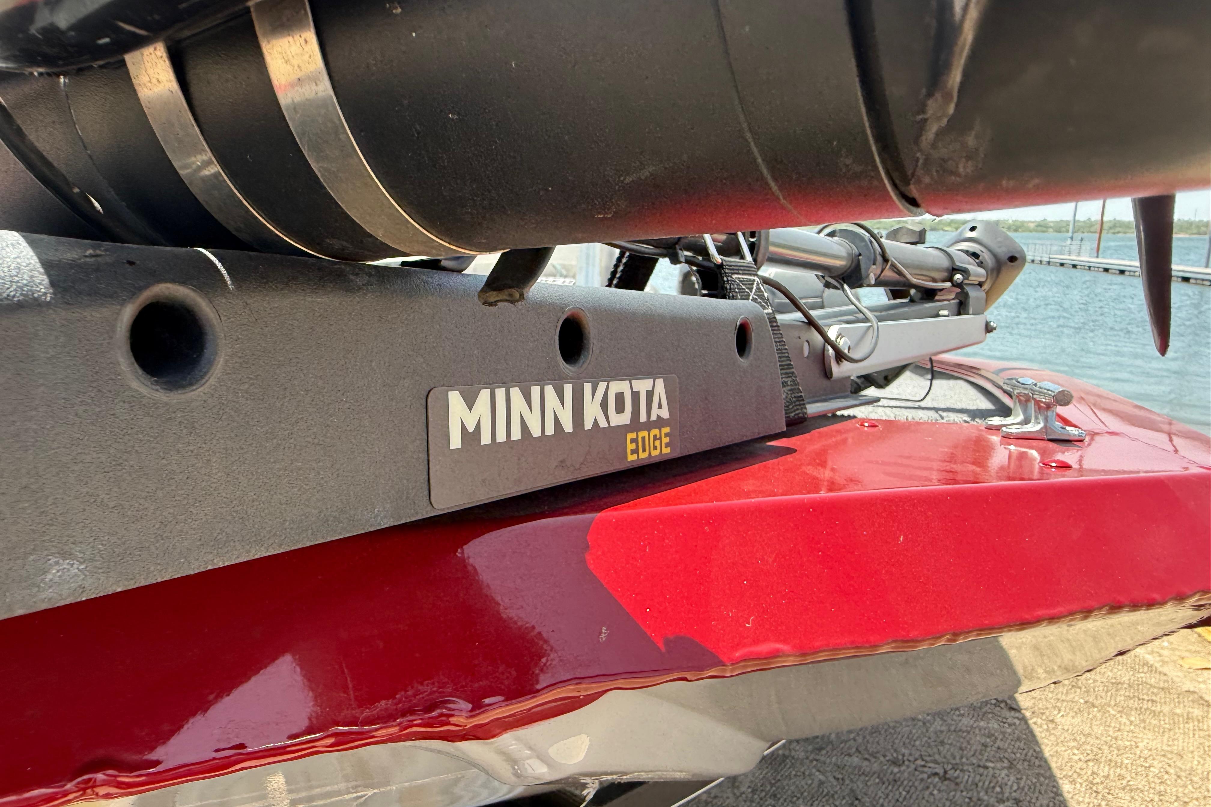 Minn Kota Edge motor on 2019 Tracker Pro 160 boat, docked by the water.