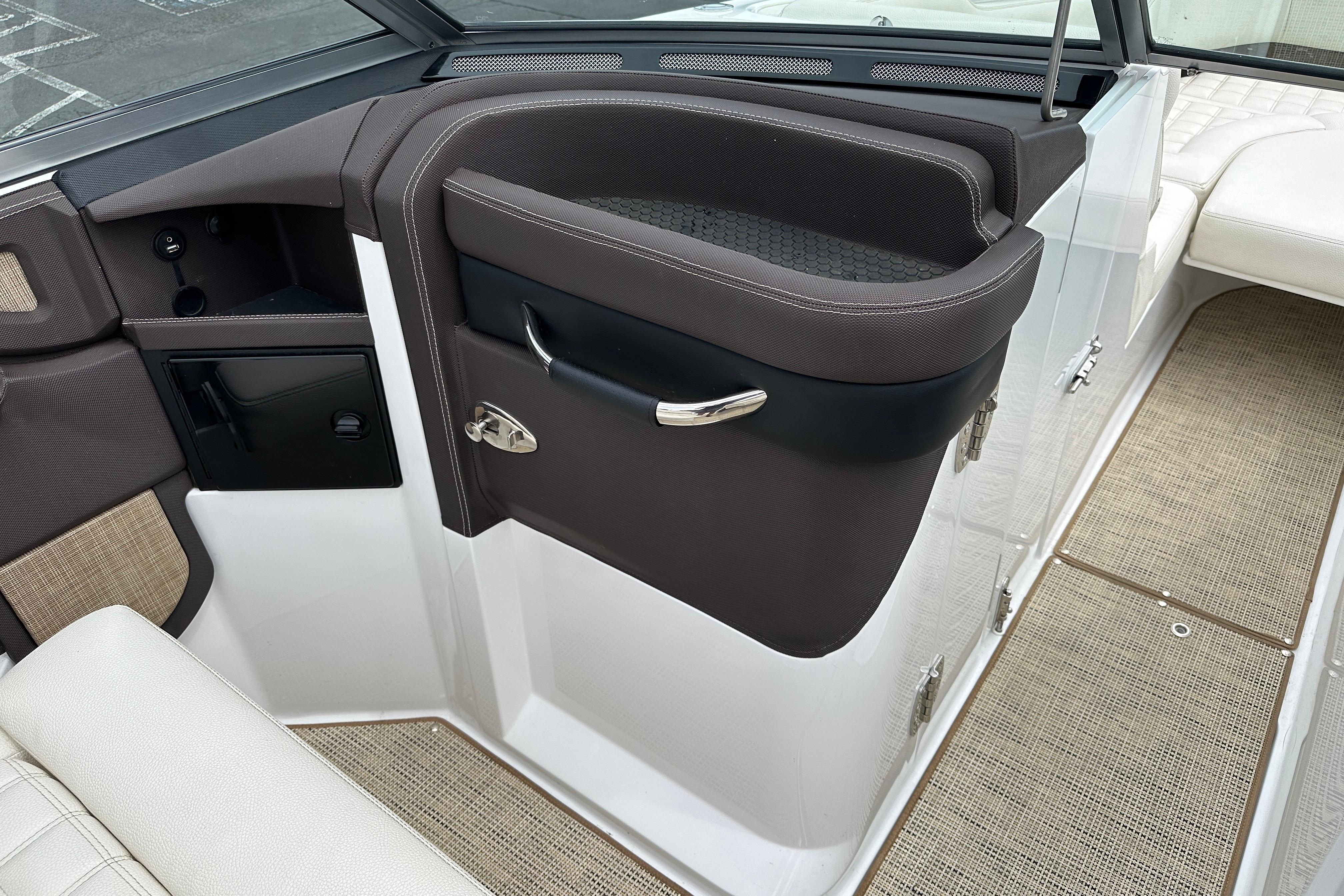 Interior view of a 2019 Cobalt R5 boat, featuring sleek seating and modern design elements.