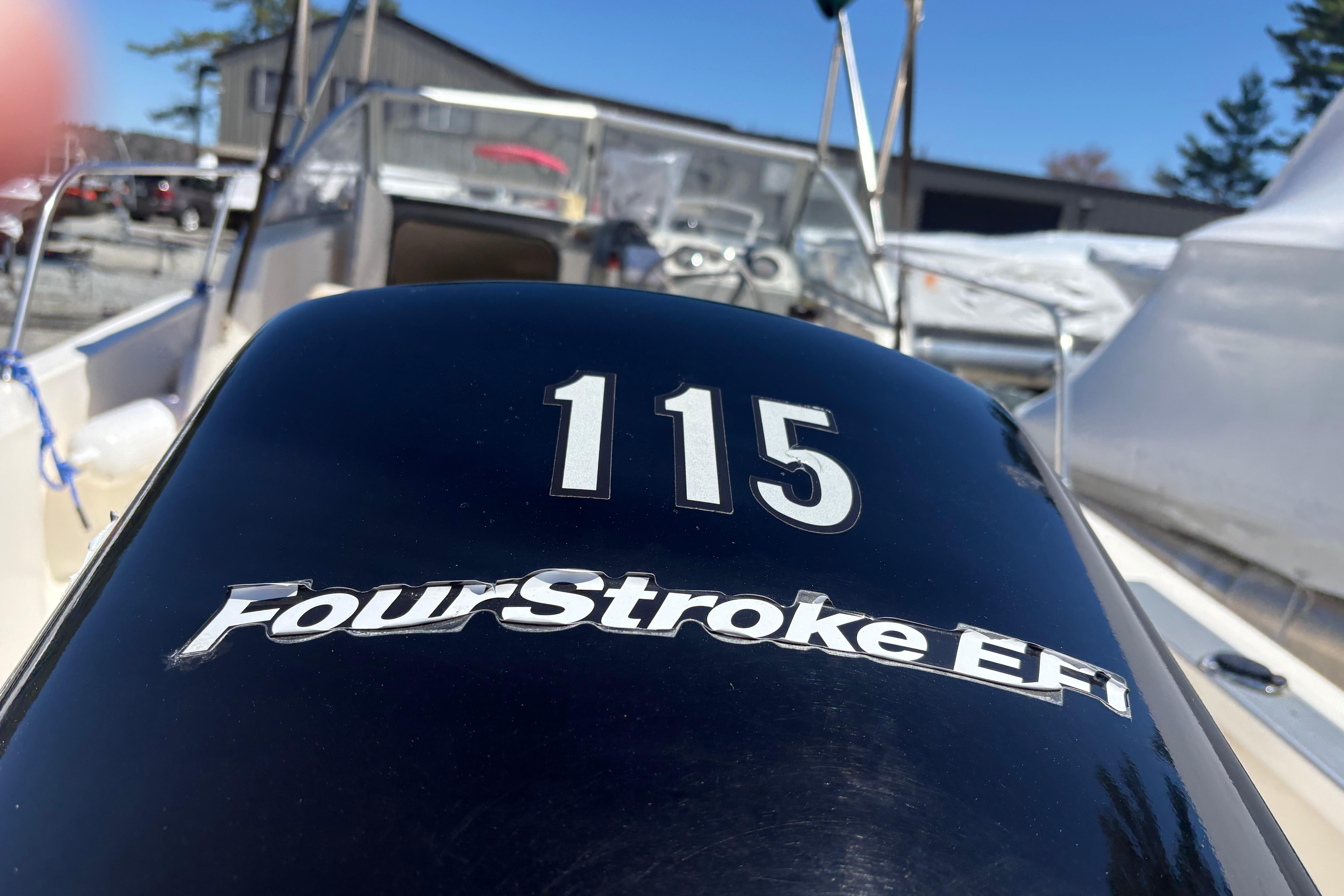 Outboard motor on 2004 Trophy 1802 Walkaround boat, featuring FourStroke EFI technology.