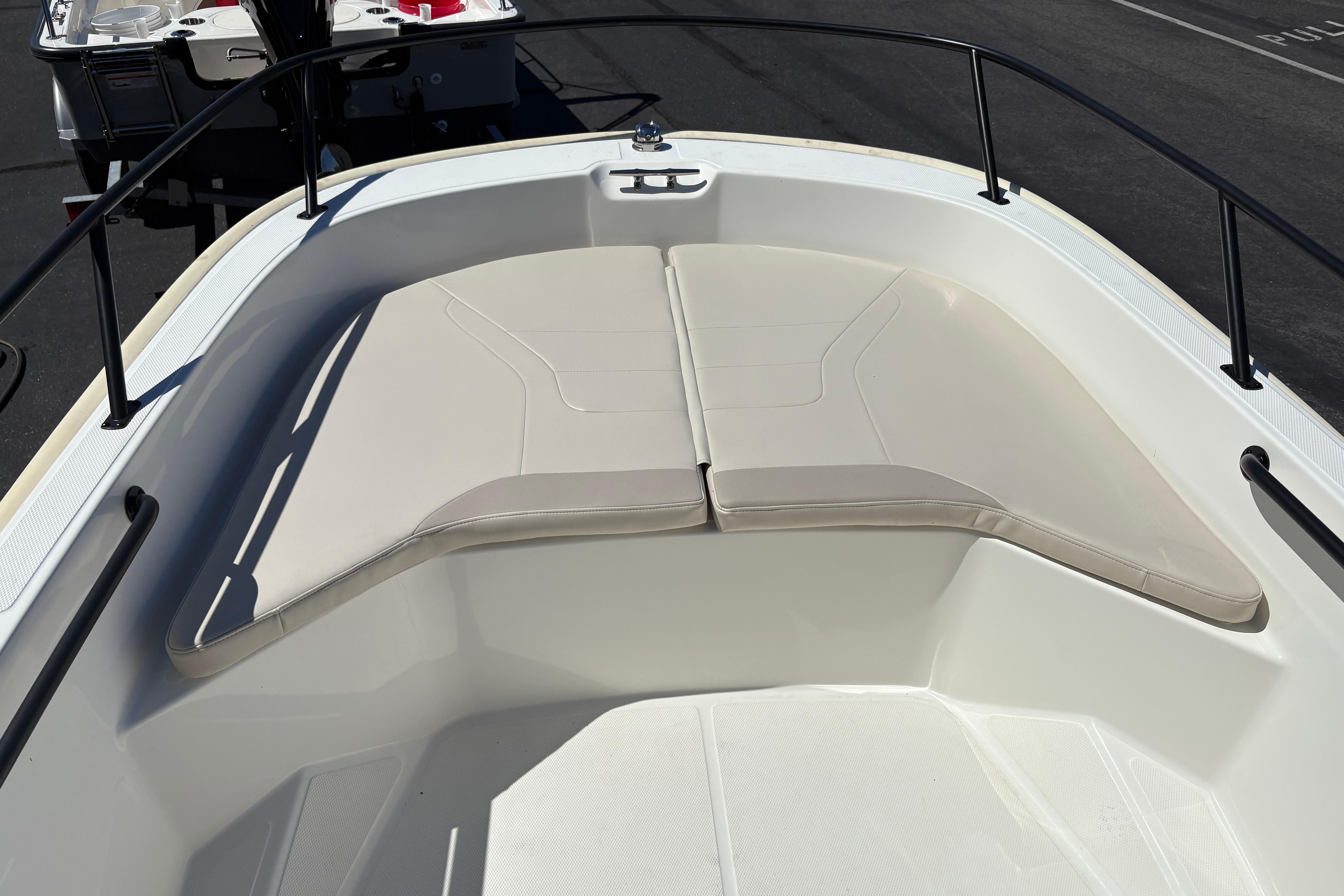 2024 Boston Whaler 160 Super Sport boat interior with cushioned seating.