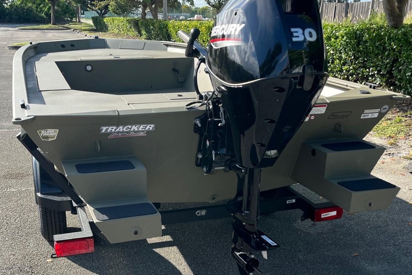 2026 Tracker Grizzly 1654 T Sportsman boat with Mercury 30 outboard motor.