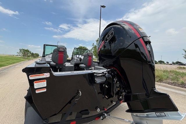 2026 Ranger VS1782SC Angler boat with powerful outboard motor on a sunny day.