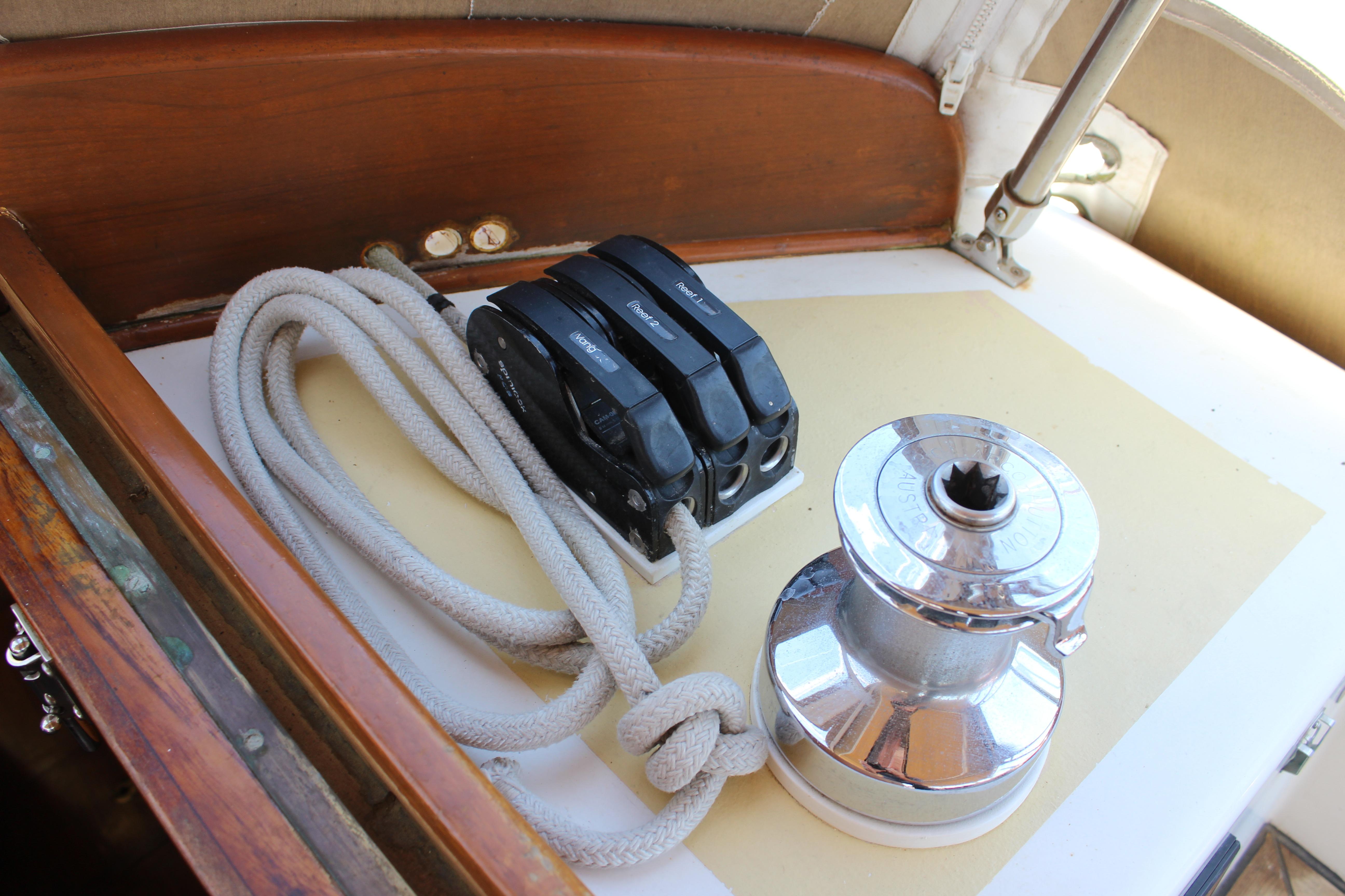 Sailing equipment on a 1981 Kelly Peterson 46 yacht, featuring winch and rope.