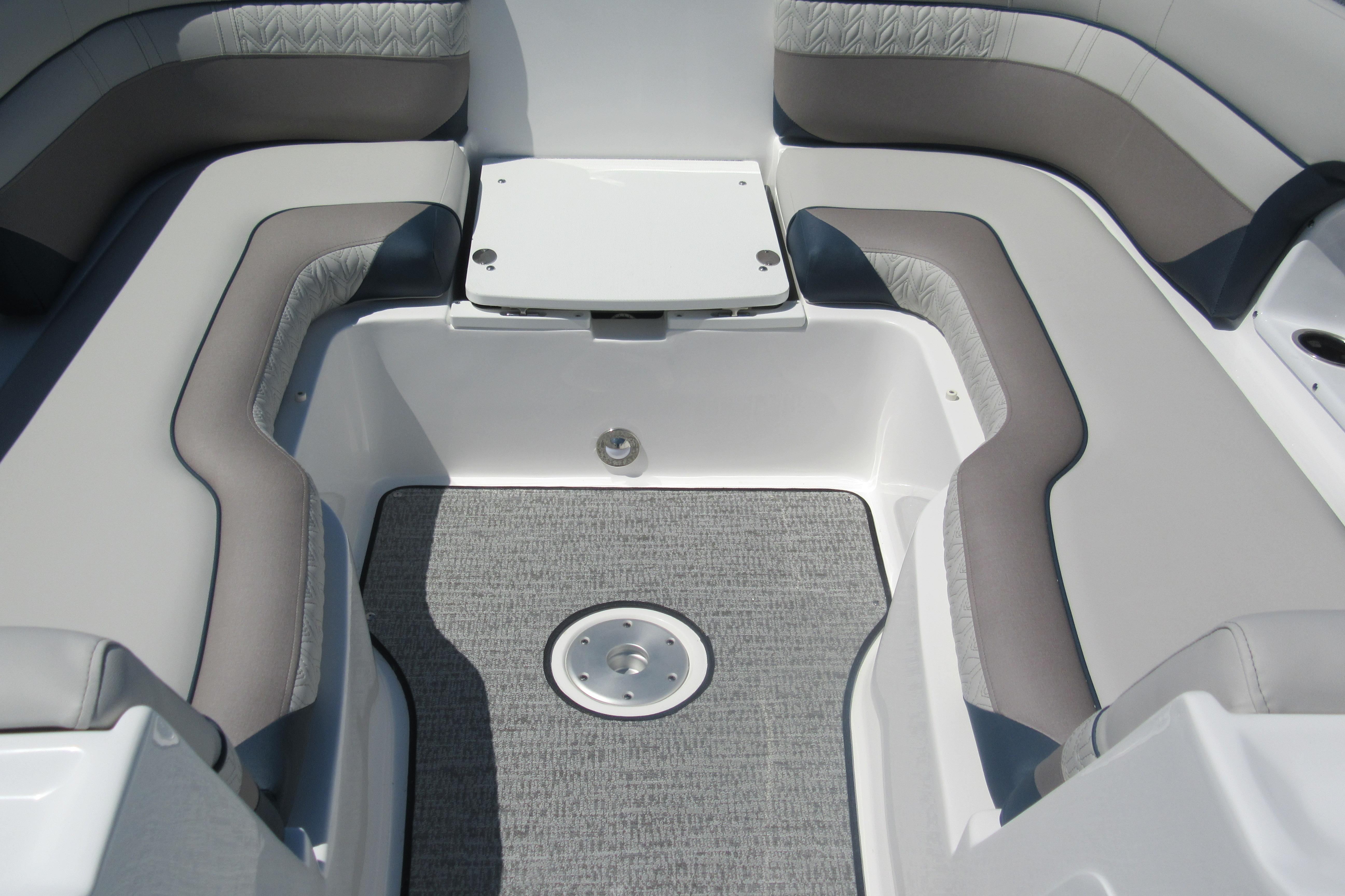 Interior seating of 2027 Hurricane SunDeck 2486 OB boat with gray upholstery.
