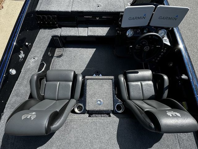 2024 Phoenix Bass Boats 20 XE interior with dual Garmin displays and comfortable seating.