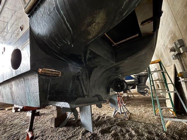 Underside of a 2004 Meridian 341 Sedan in a boatyard.