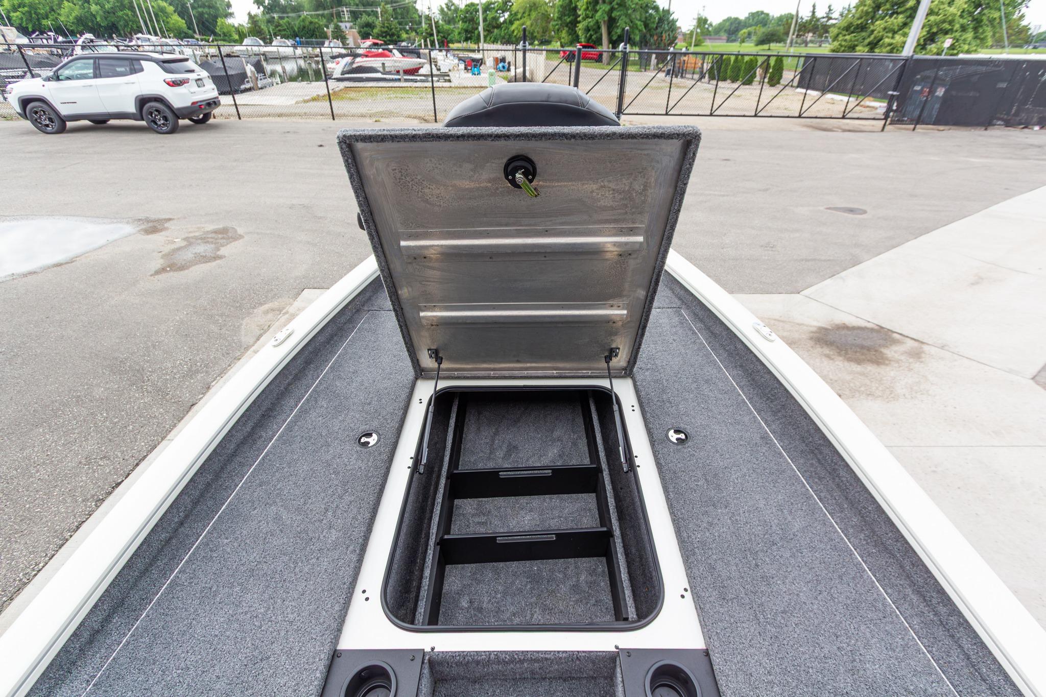 2023 Tracker Pro Team 190 TX boat storage compartment open, showcasing spacious interior.